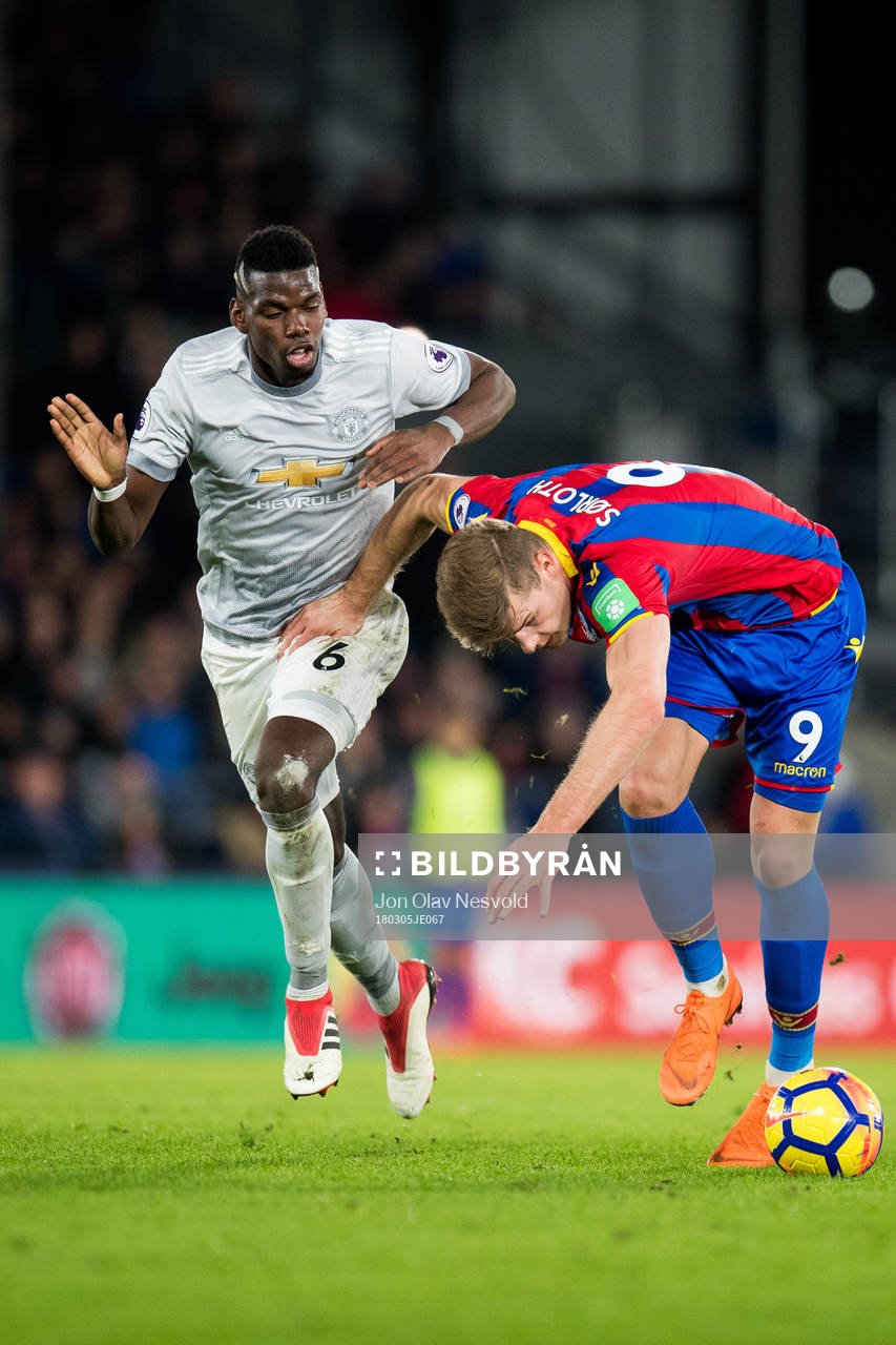 Paul Pogba of Manchester United and Alexander Sørloth of