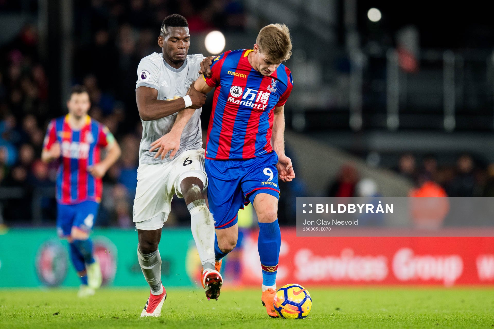 Paul Pogba of Manchester United and Alexander Sørloth of