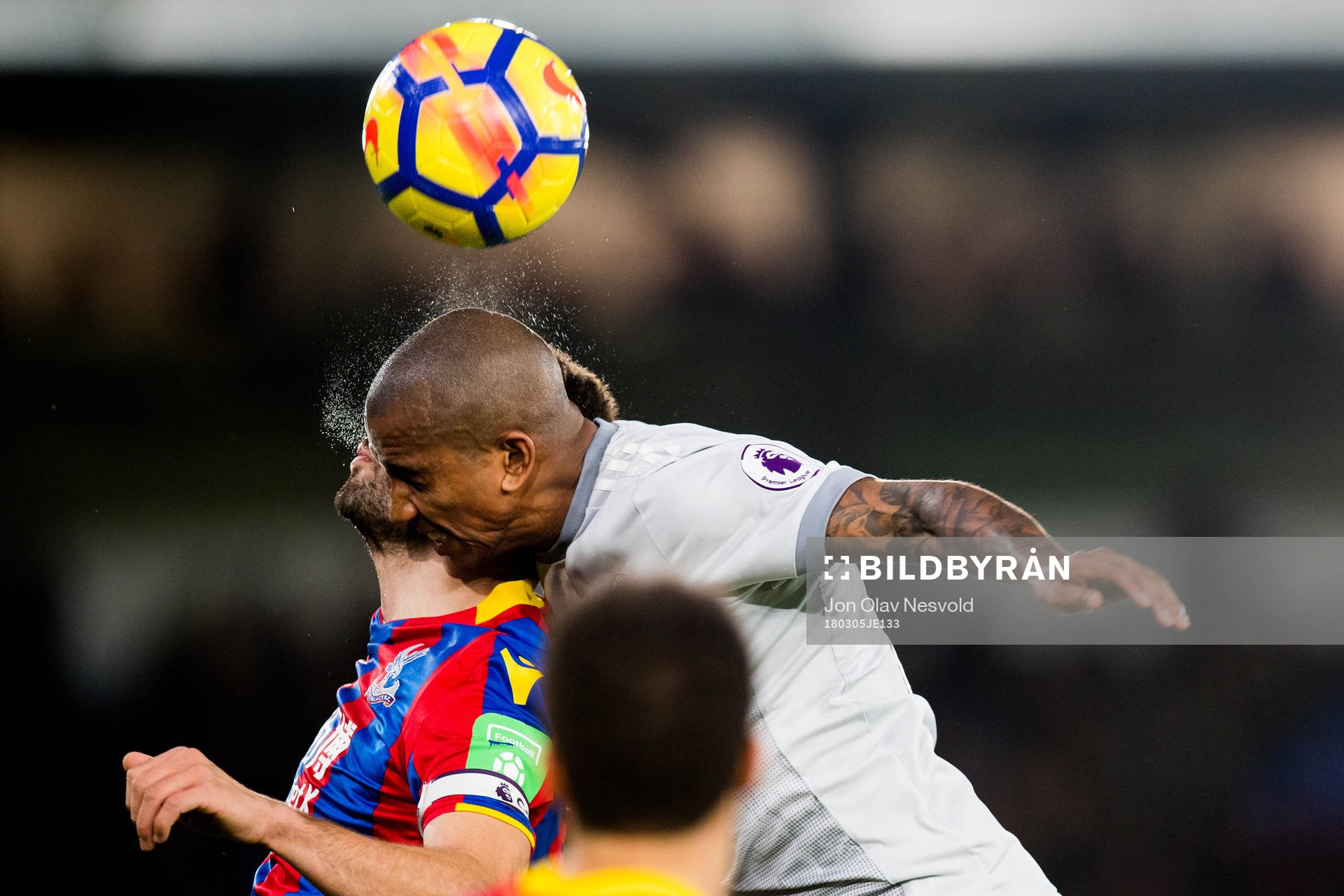 Luka Milivojevic of Crystal Palace and Chris Smalling of
