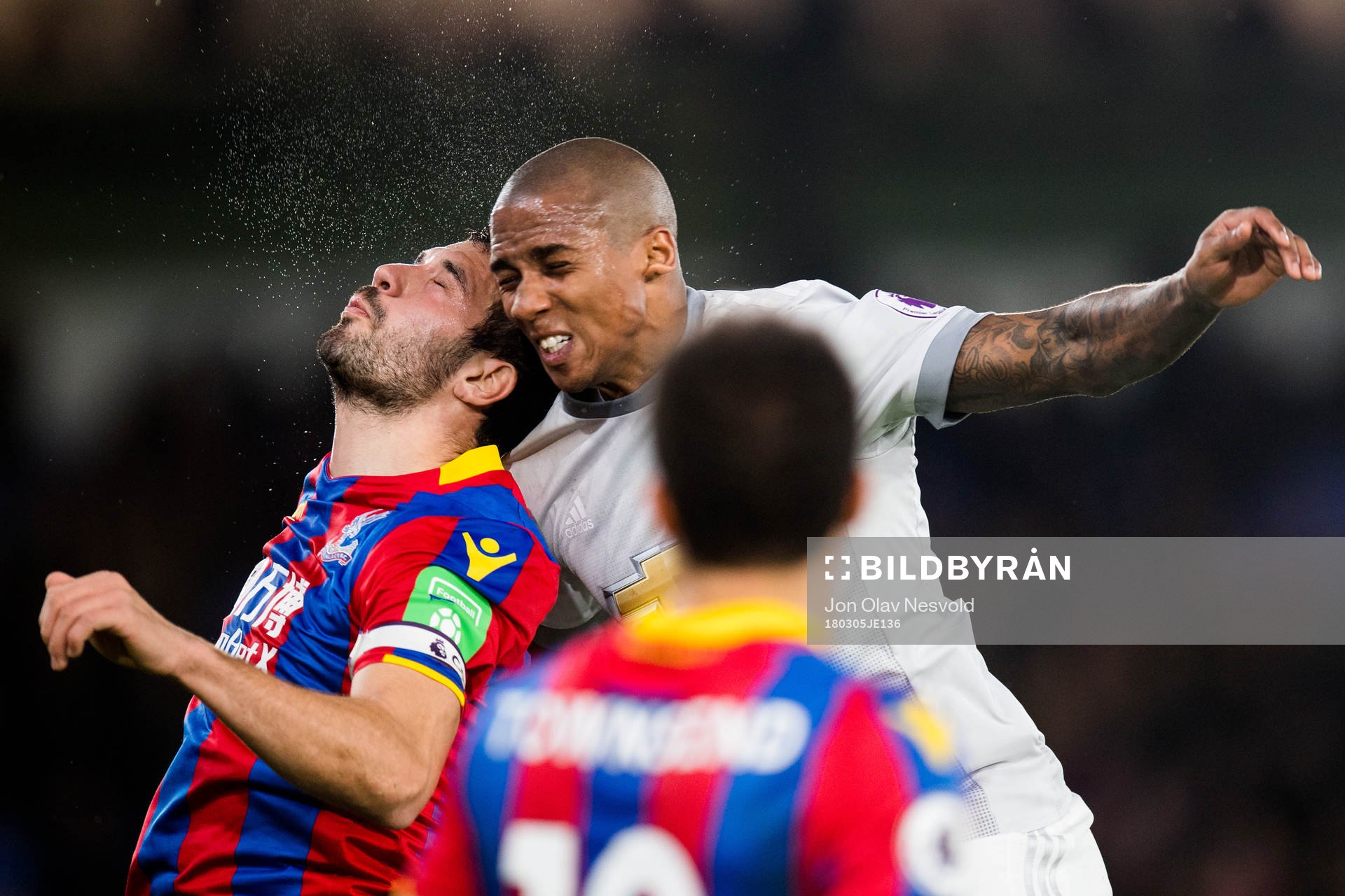 Luka Milivojevic of Crystal Palace and Chris Smalling of