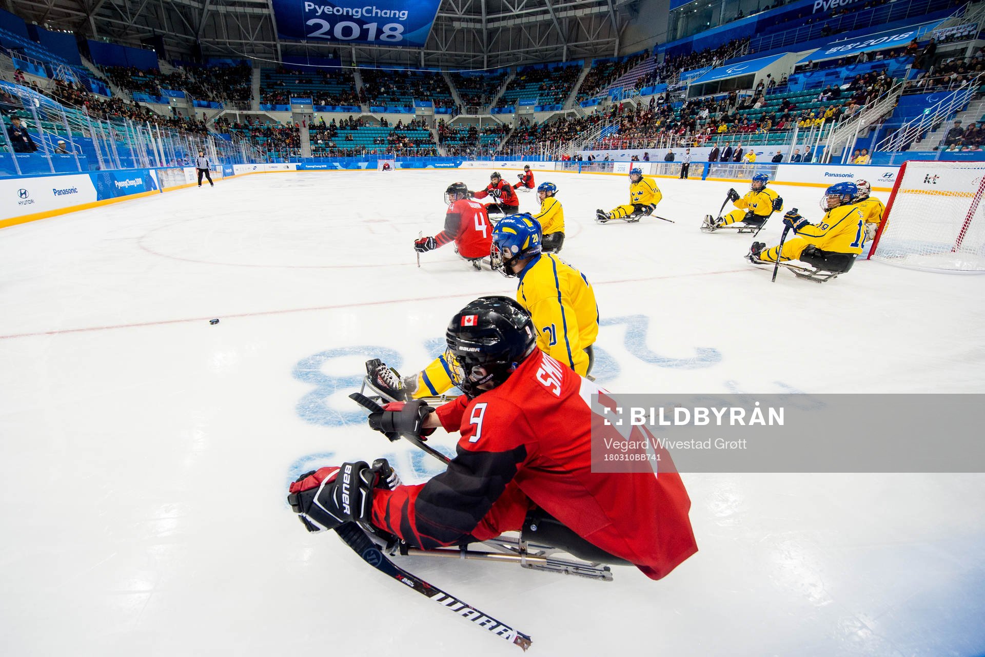 Corbyn Smith of Canada and Niklas Rakos of Sweden