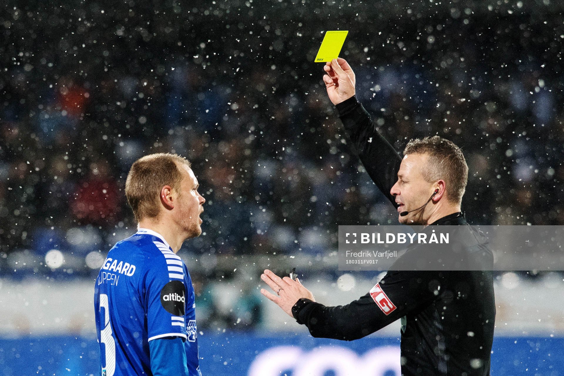 Matti Lund Nielsen gets a yellow card from the referee