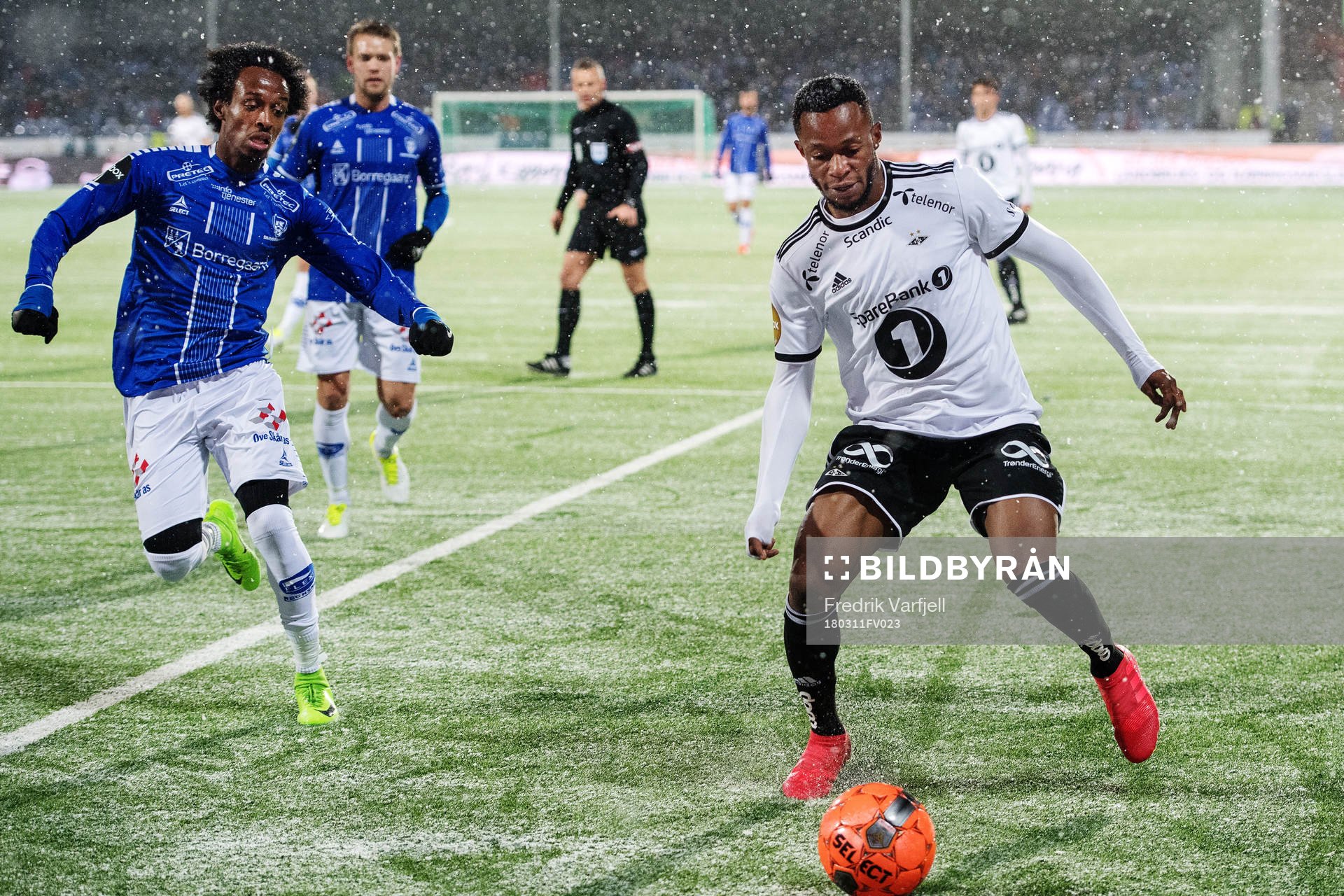 Amin Askar of Sarpsborg 08 and Samuel Adegbenro of Rosenborg during the Eliteserien match between Sarpsborg 08 and Rosenborg on March 11, 2018 in Sarpsborg. 