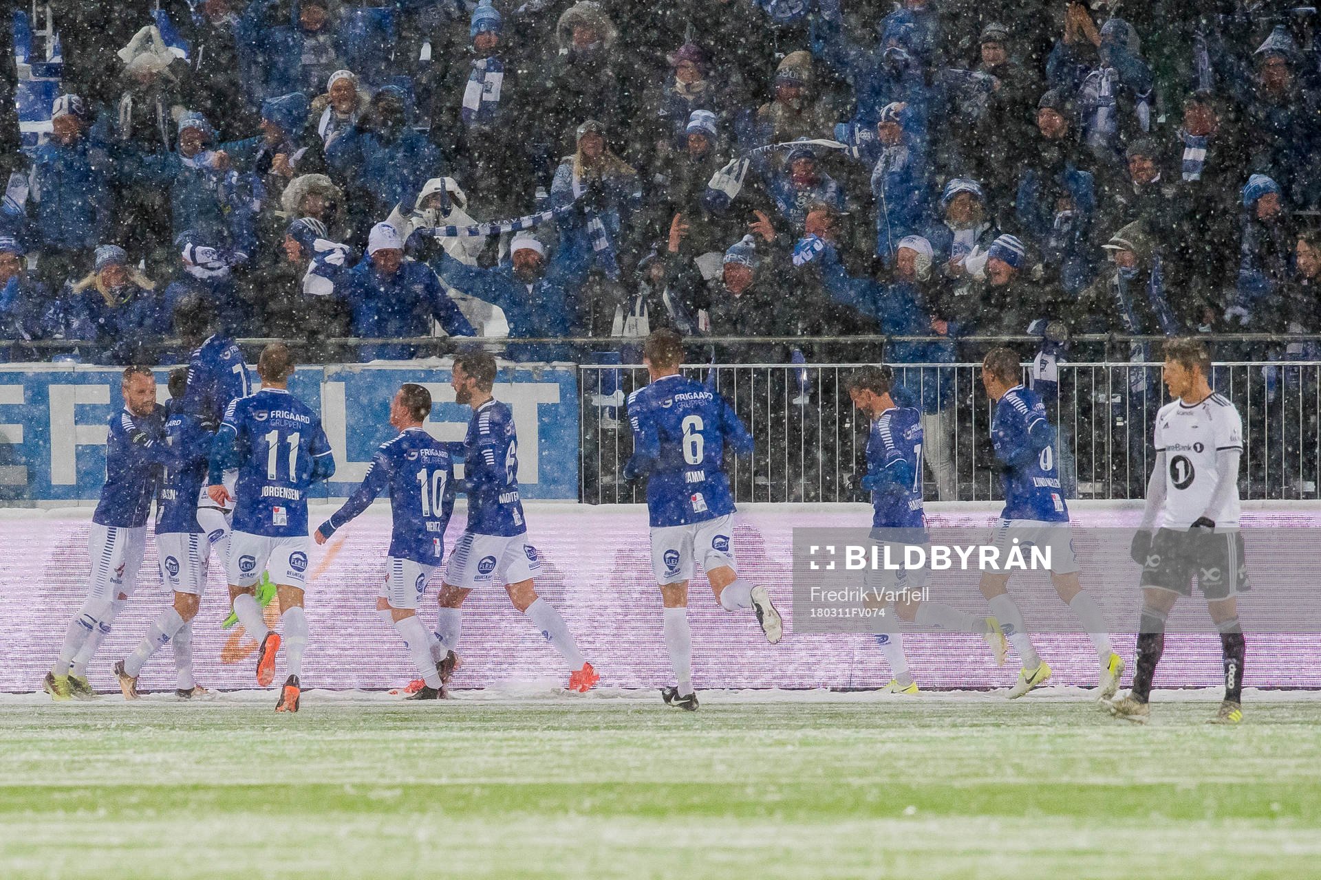 Kristoffer Zachariassen of Sarpsborg 08 celebrates with his teammates after scoring 1-0 during the Eliteserien match between Sarpsborg 08 and Rosenborg on March 11, 2018 in Sarpsborg. 