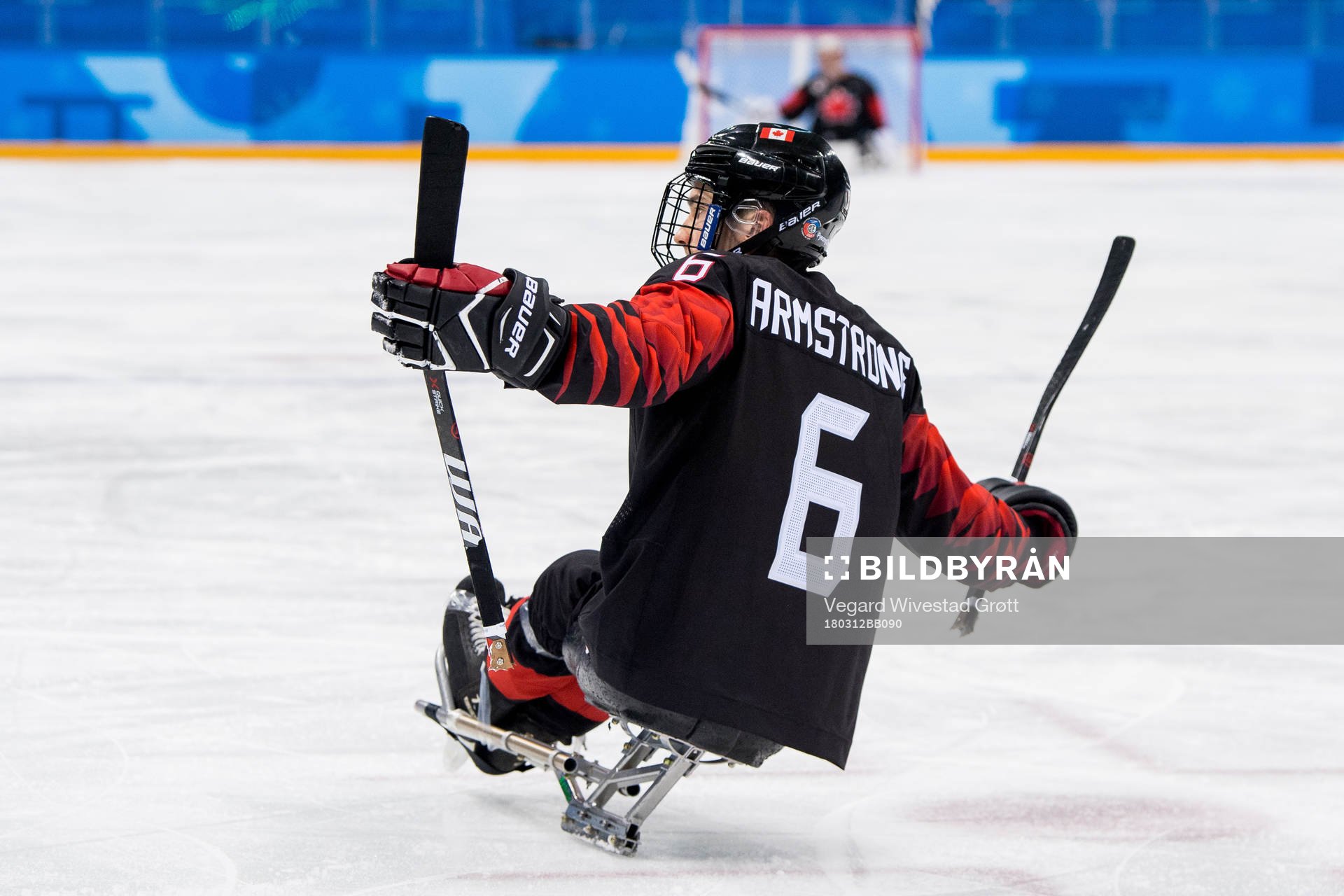 Rob Armstrong of Canada celebrates scoring a goal