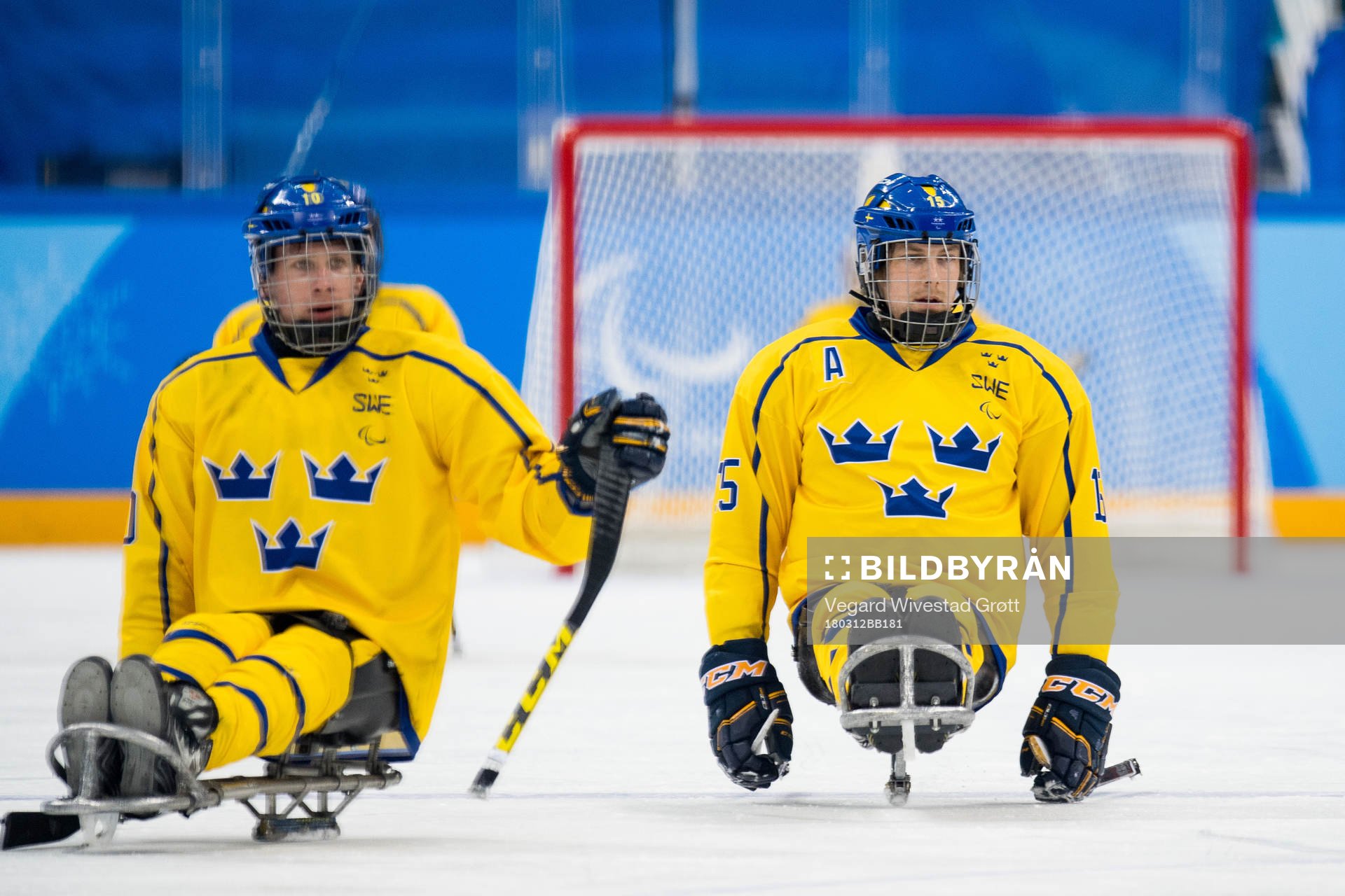 Robin Meng and Christian Hedberg of Sweden look dejected