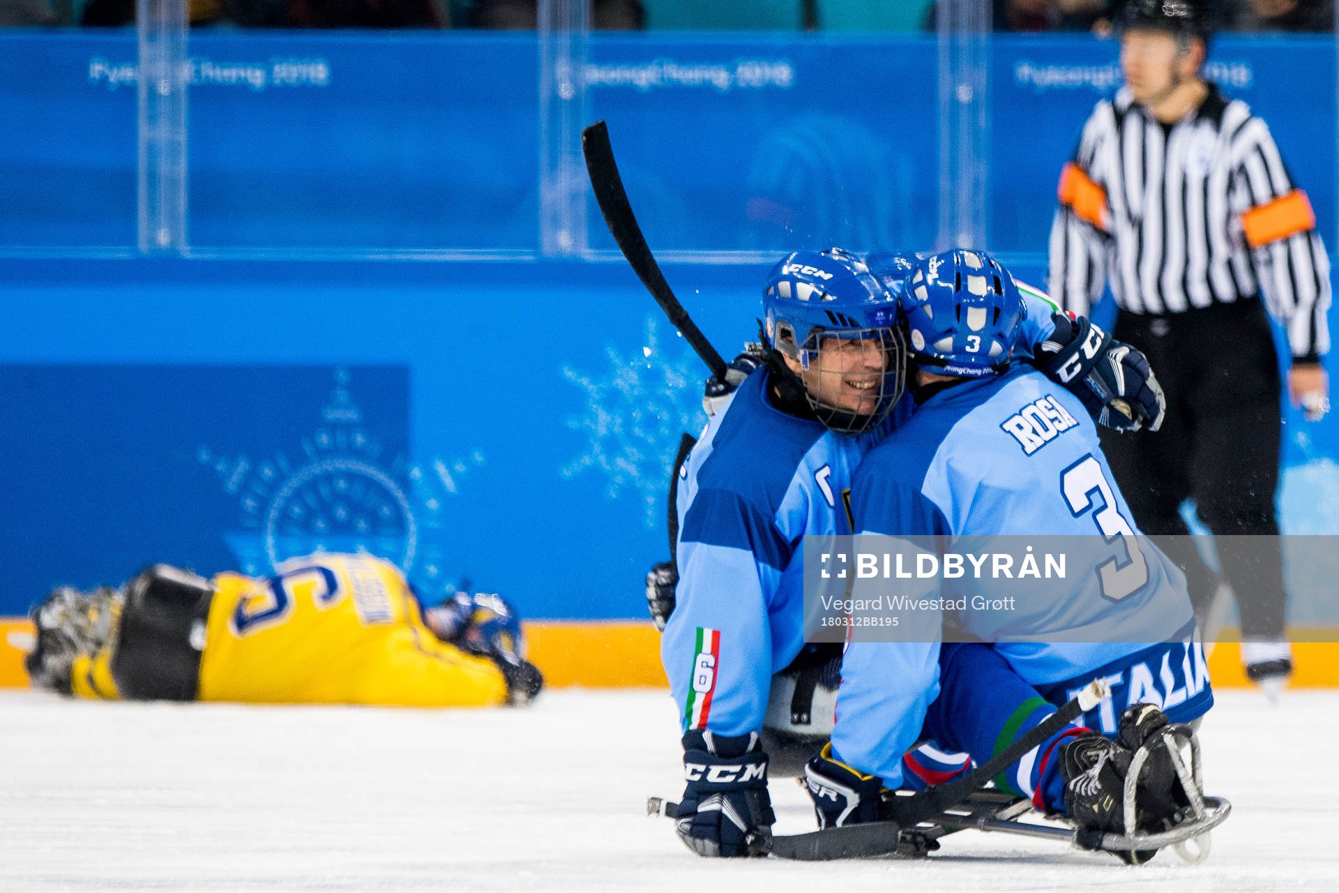 Gianluigi Rosa of Italy celebrates with teammate Gian Luca