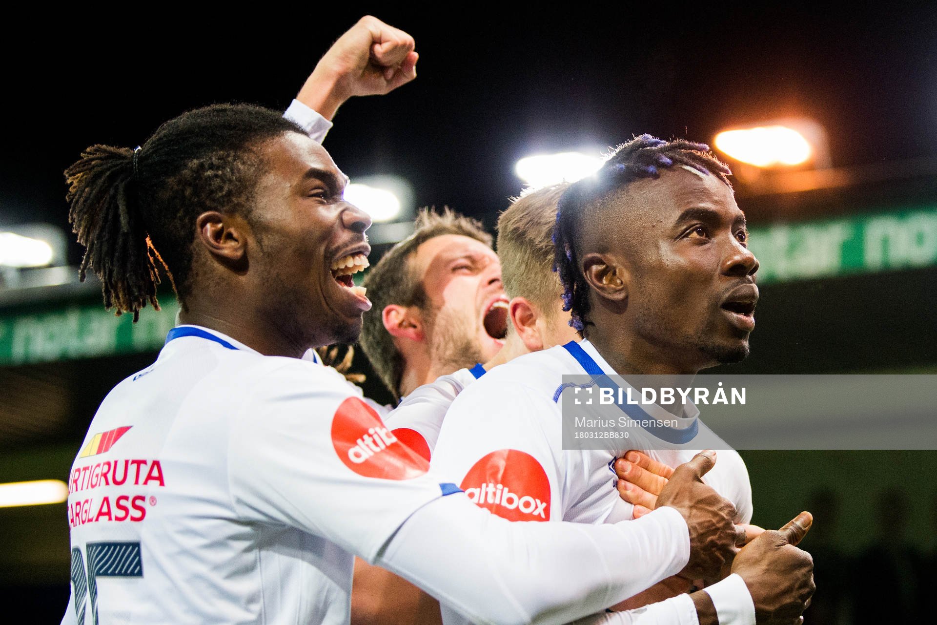 Sam Adekugbe and Sam Johnson of Vålerenga celebrate 1-0 during the Eliteserien match between Kristiansund and Vålerenga on March 12, 2018 in Kristiansund.
