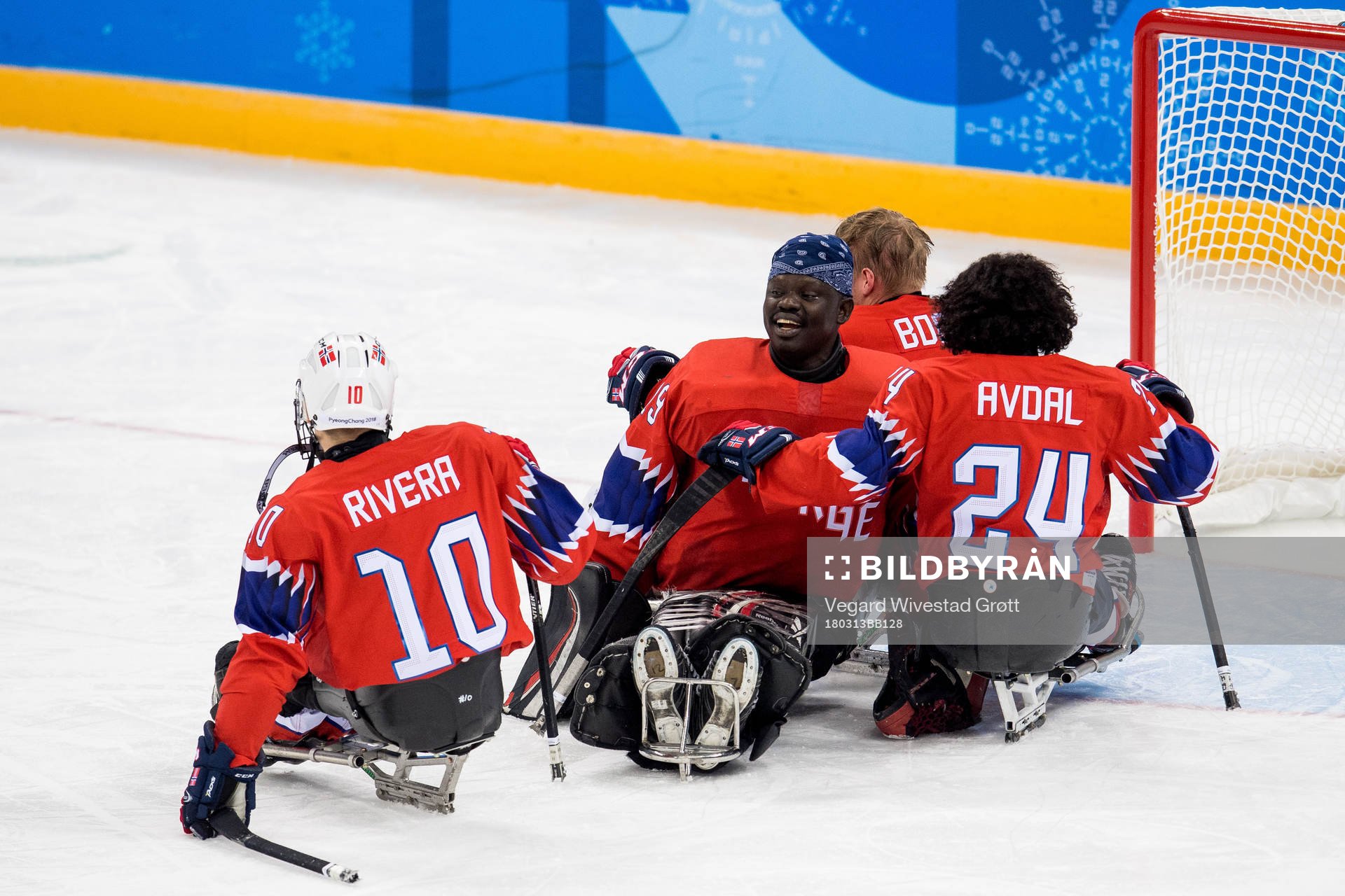 Goaltender Kissinger Deng of Norway celebrates with