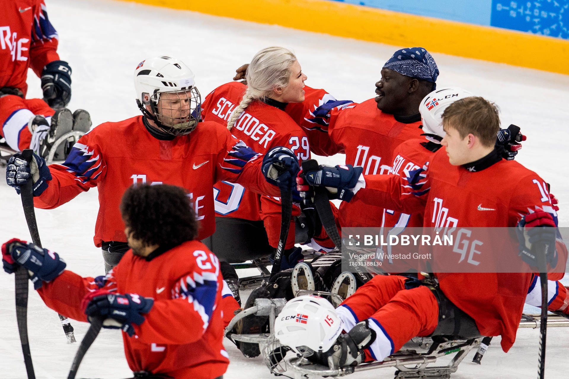 Lena Schrøder and goaltender Kissinger Deng of Norway