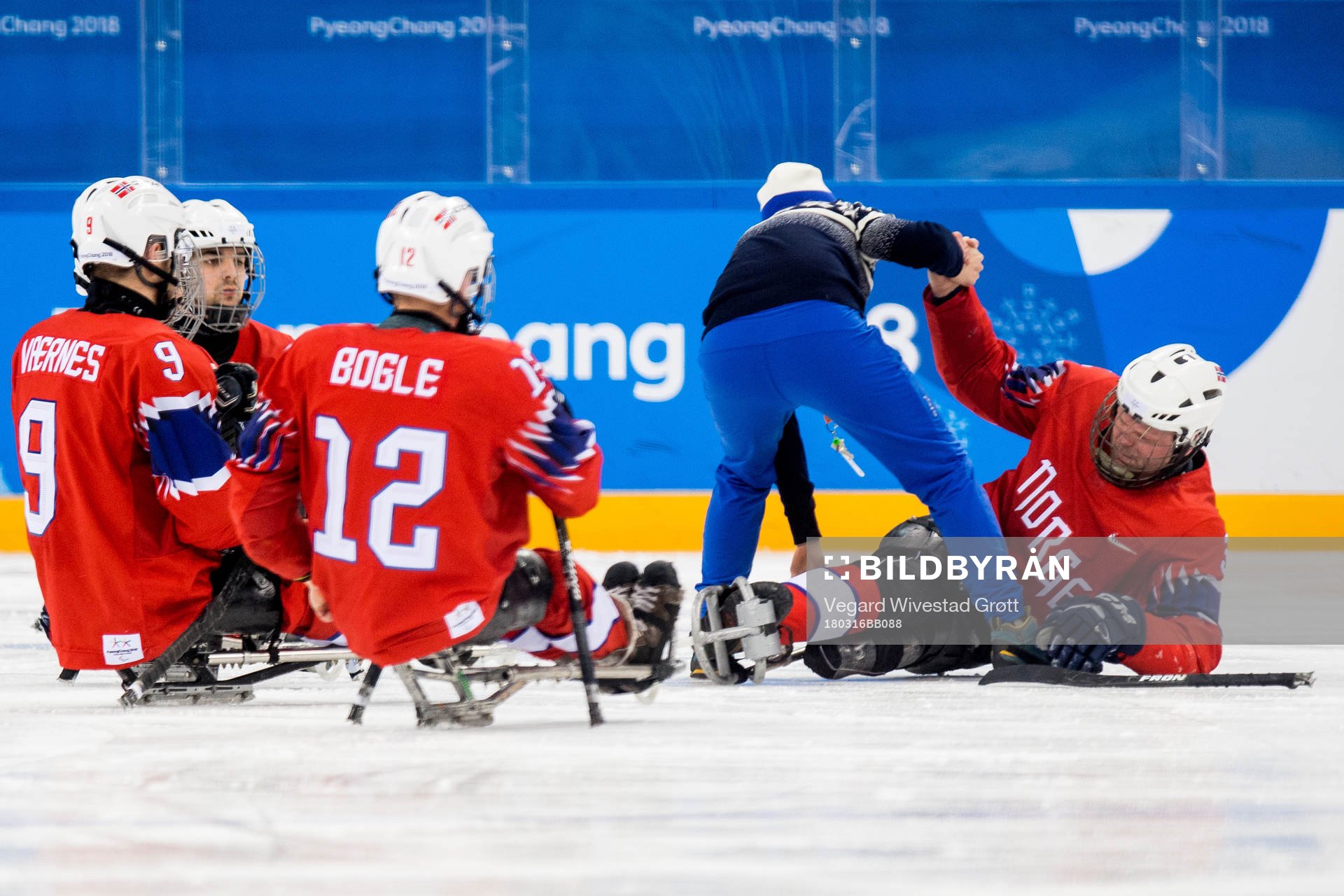 Rolf Einar Pedersen of Norway lies down with an injury