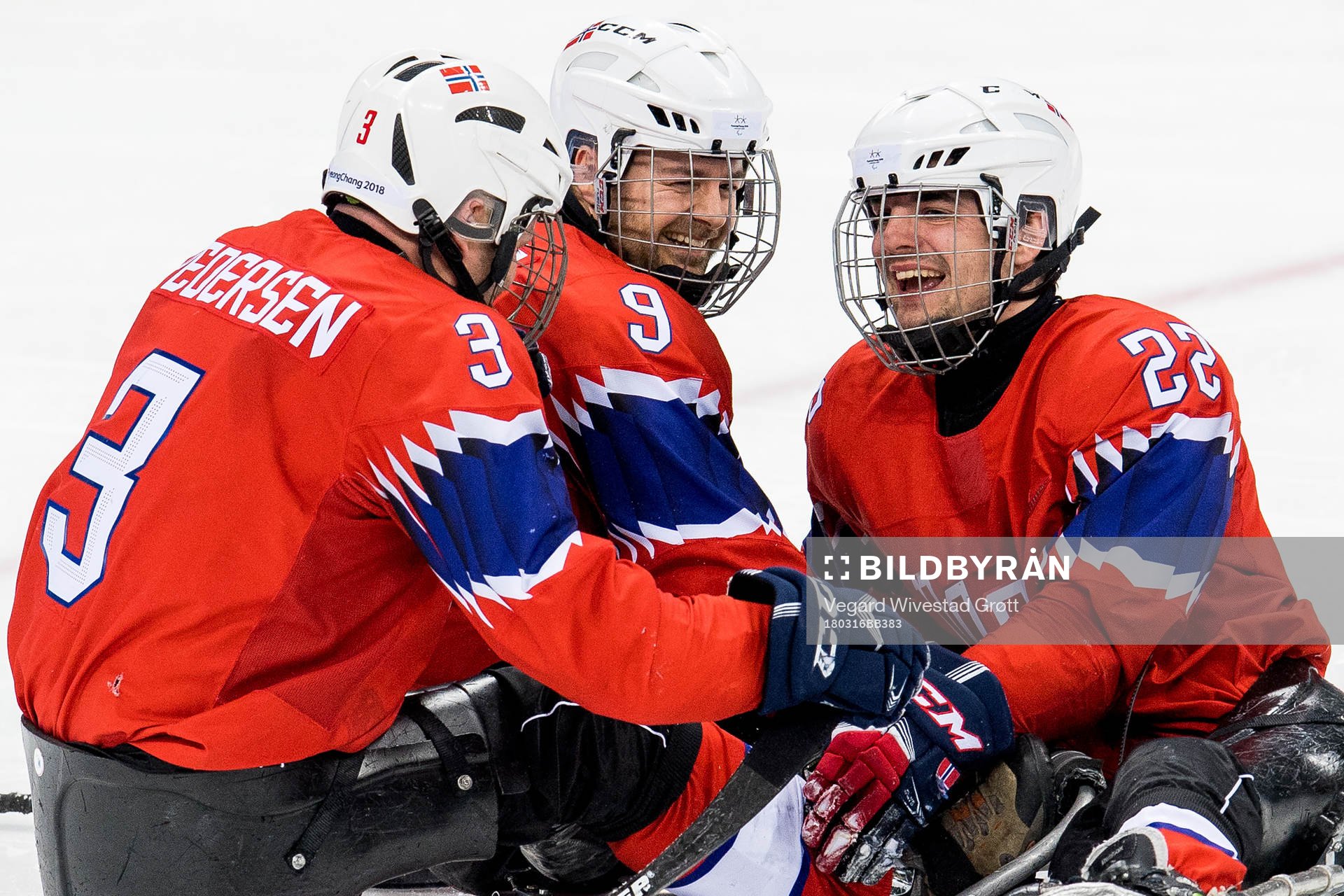 Audun Bakke of Norway celebrates with teammates Rolf Einar