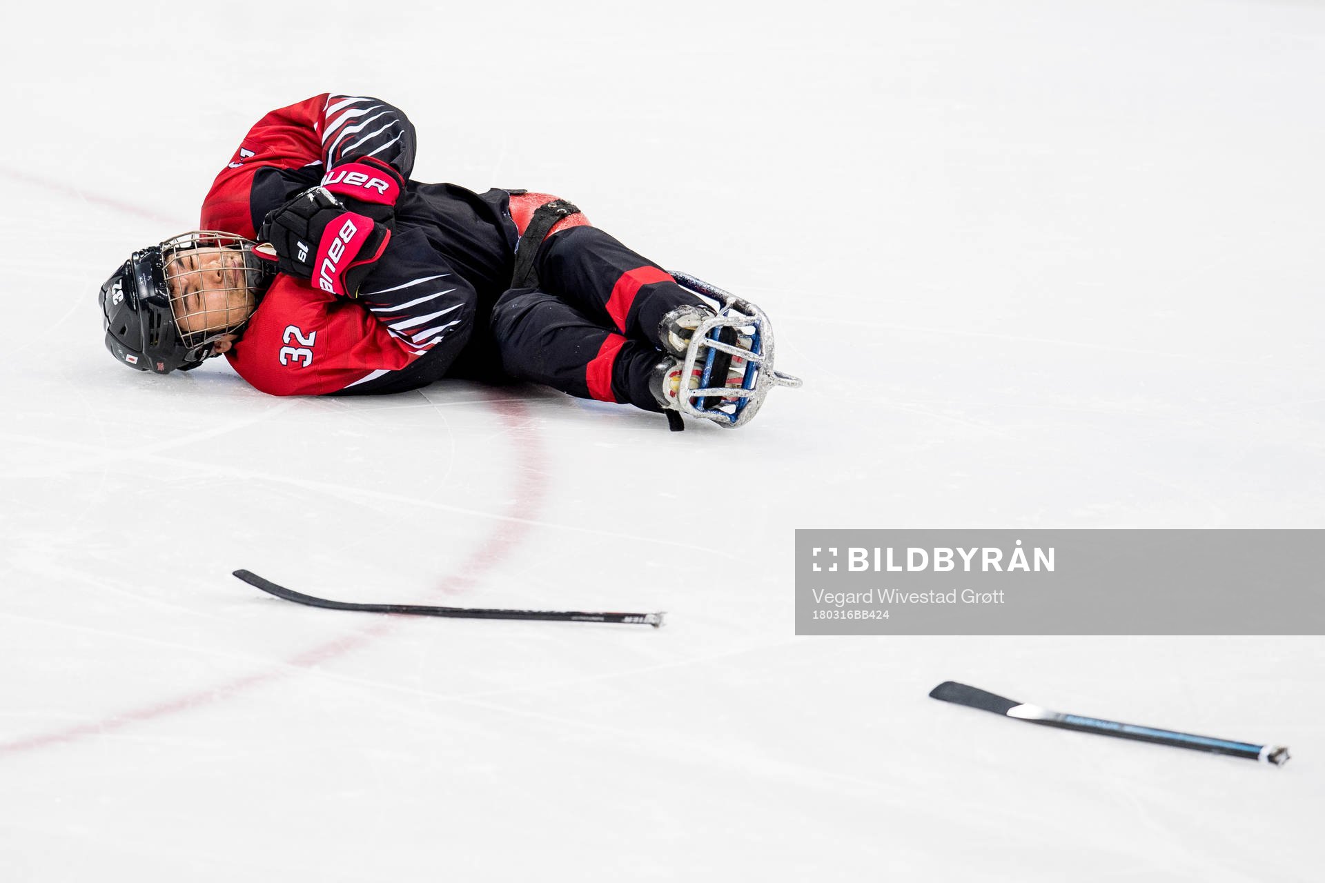 Daisuke Uehara of Japan lies down with an injury