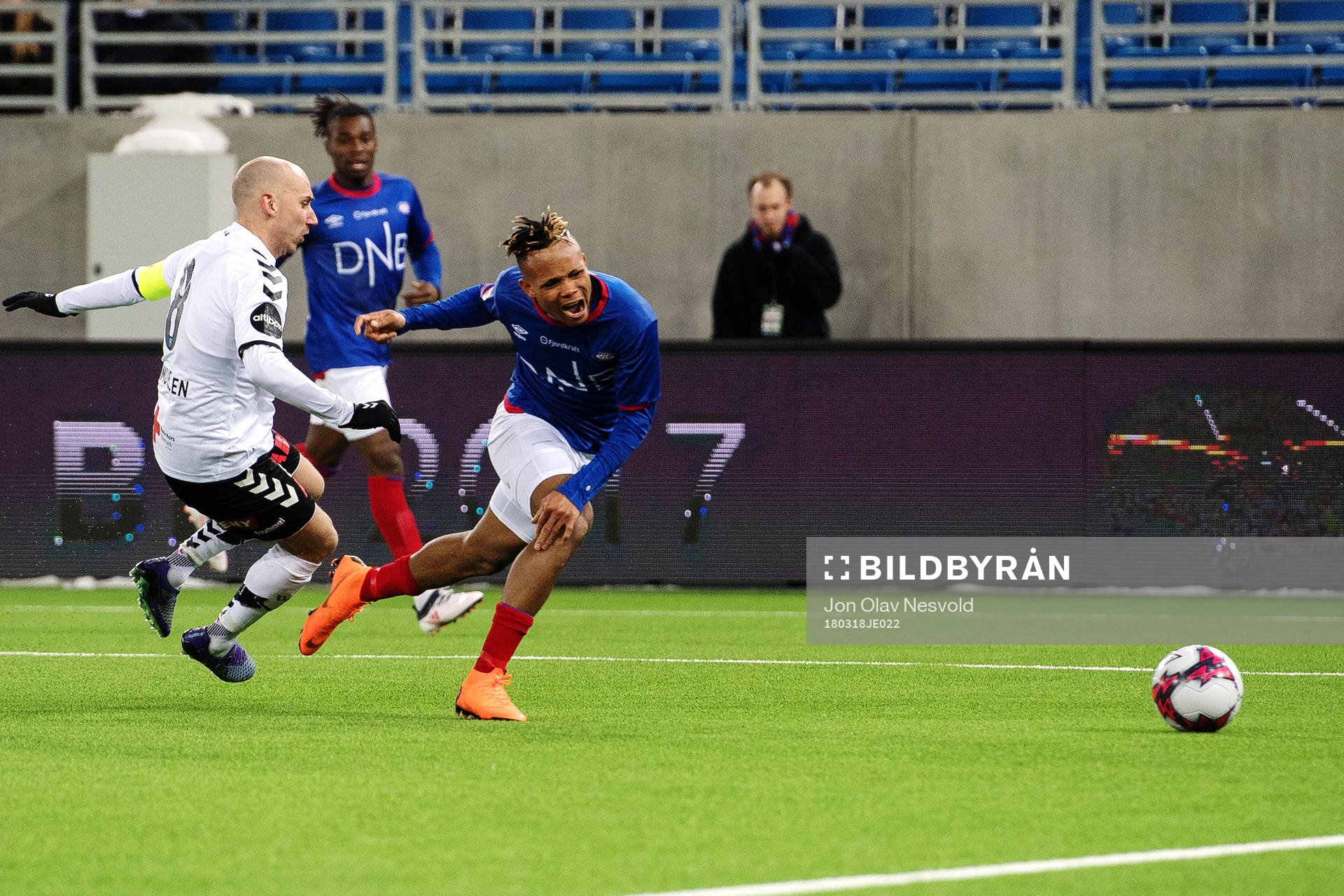 Jone Samuelsen of Odd tackles Chidera Ejuke of Vålerenga