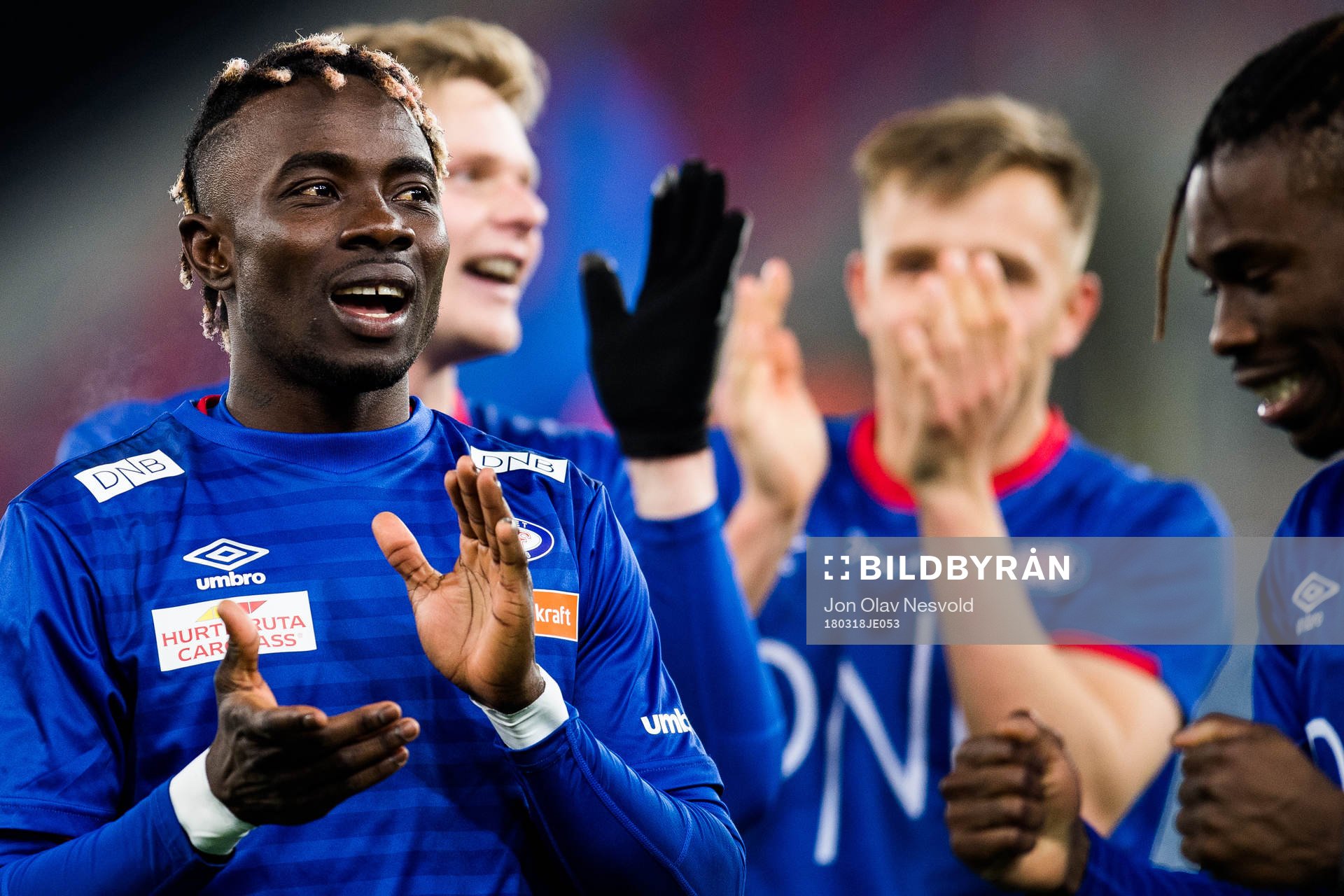 Sam Johnson of Vålerenga and Samuel Adekugbe of Vålerenga celebrate after the Eliteserien match between Vålerenga and Odd on March 18, 2018 in Oslo.