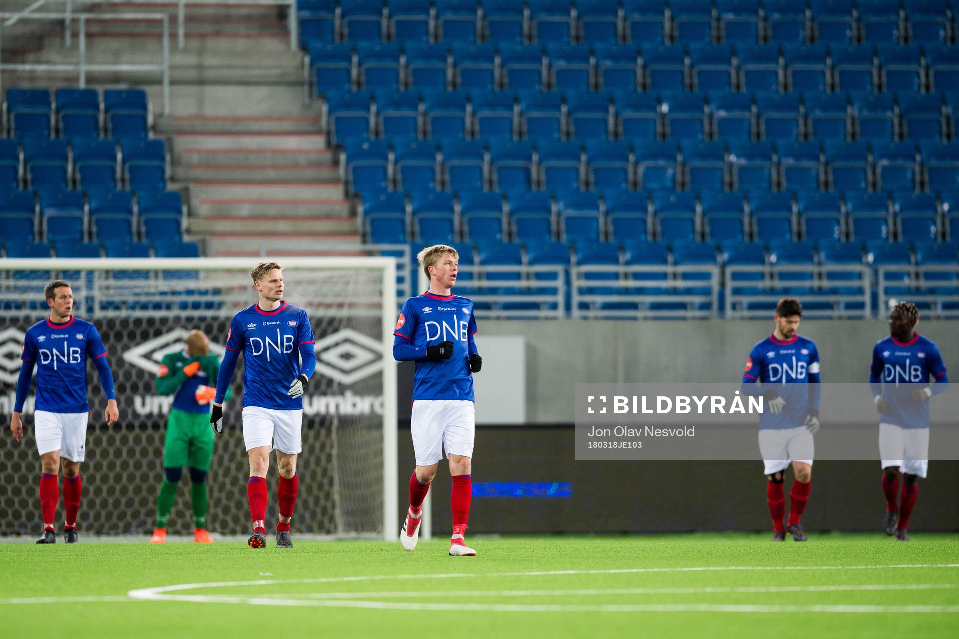 Samuel Fridjonsson of Vålerenga and his teammates