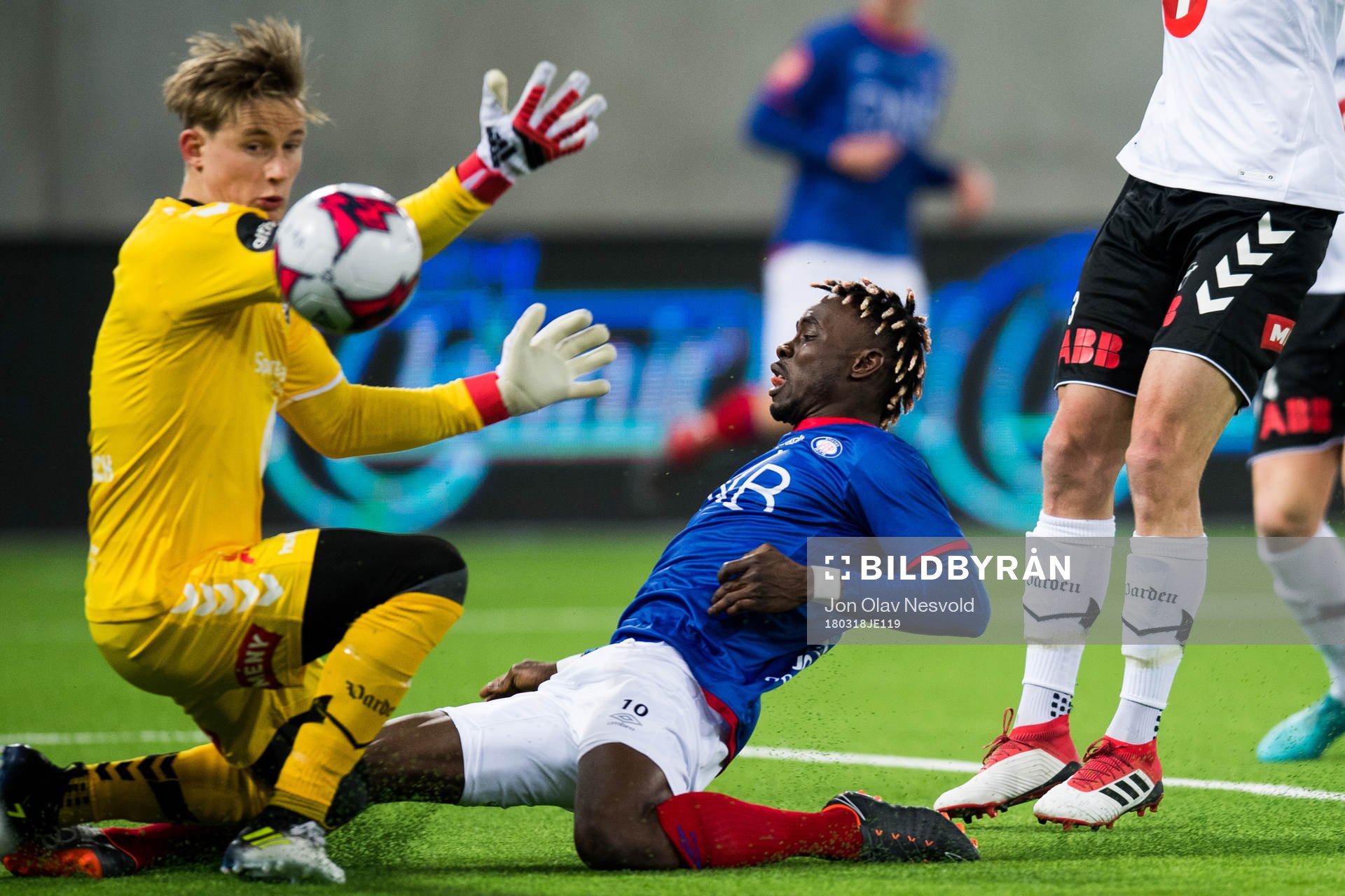 Goalkeeper Sondre Løvseth Rossbach of Odd and Sam Johnson