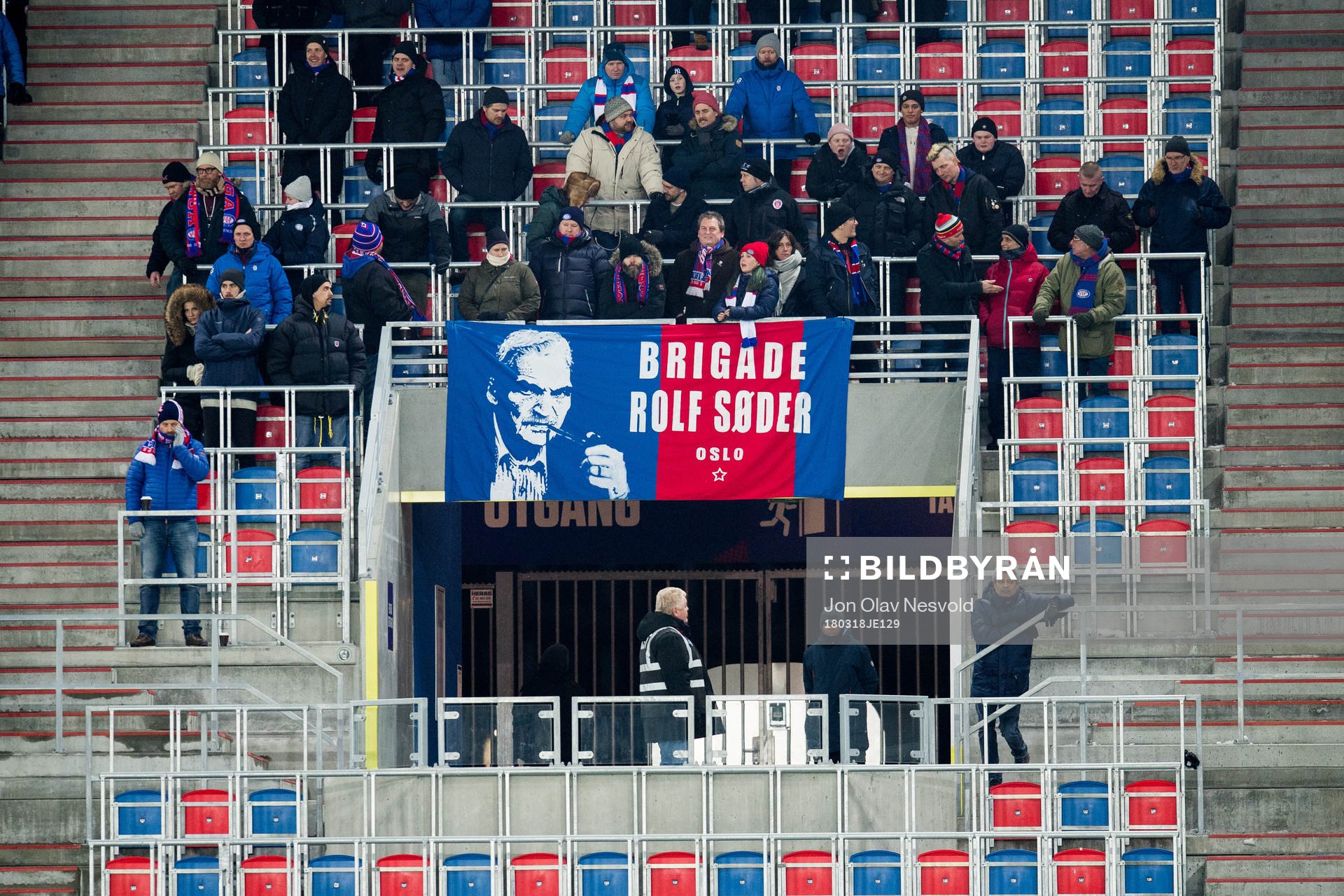 Spectators with a banner of Brigade Rolf Søder