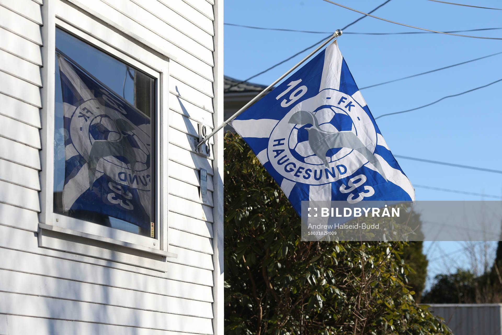 A Haugesund flag is flown outside a house in the town centre