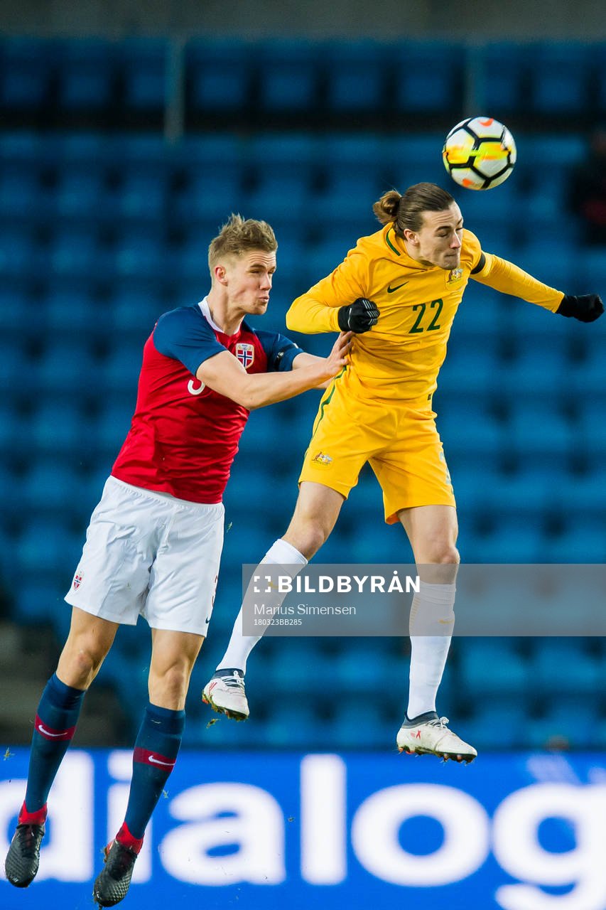 Kristoffer Ajer of Norway and Jackson Irvine of Australia