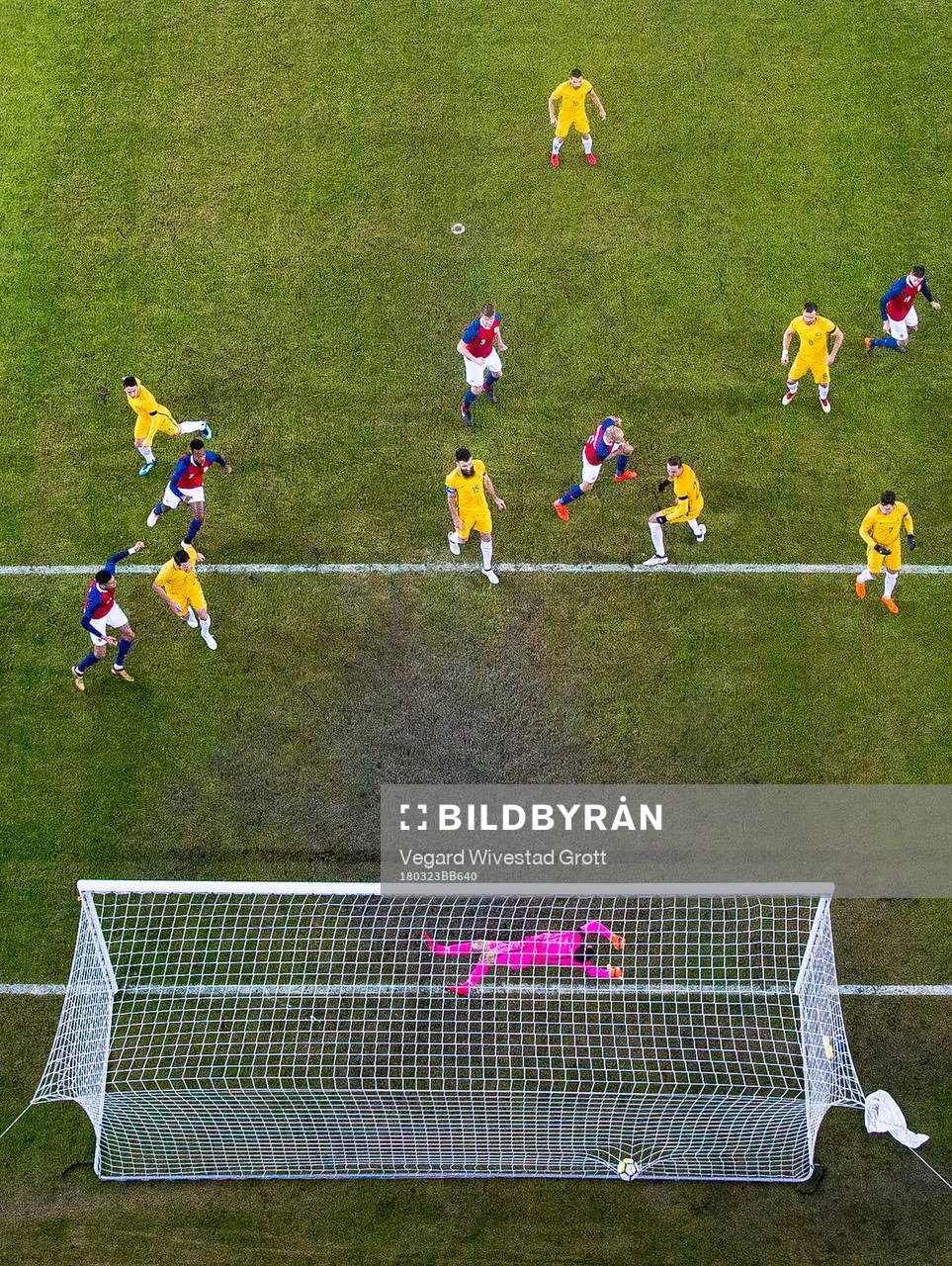 Tore Reginiussen of Norway scores 2-1 behind goalkeeper Mat