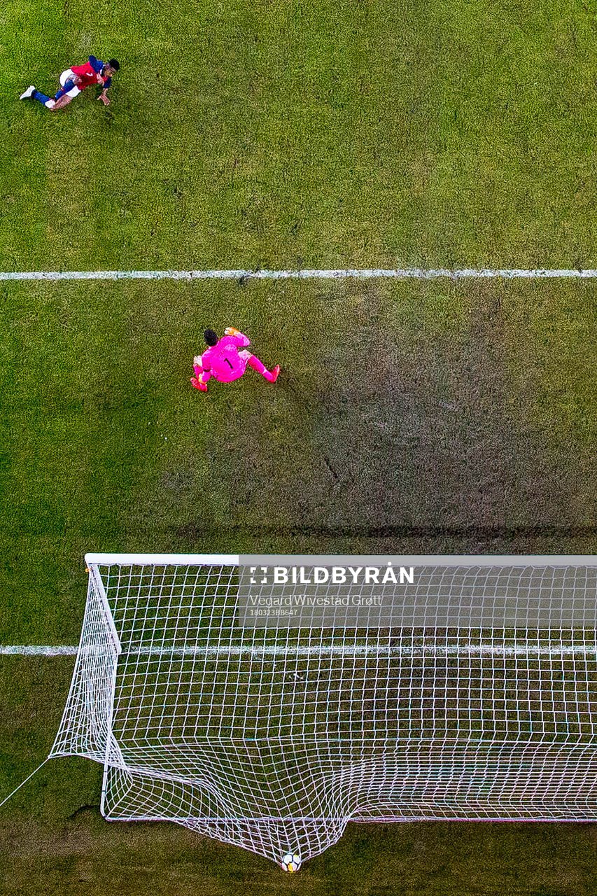 Ola Kamara of Norway scores 3-1 behind goalkeeper Mat Ryan of Australia during the international friendly football match between Norway and Australia on March 23, 2018 in Oslo.