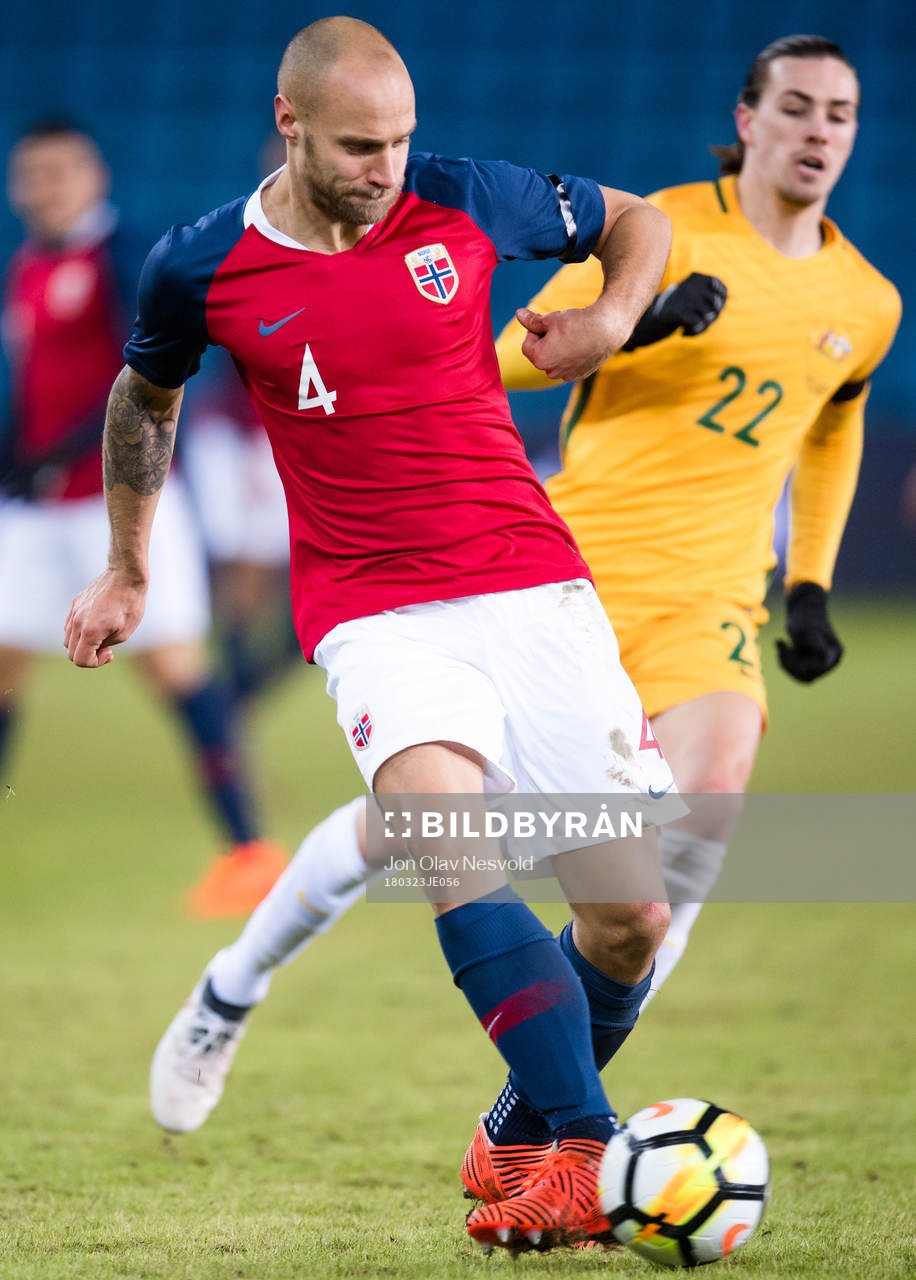 Tore Reginiussen of Norway and Jackson Irvine of Australia
