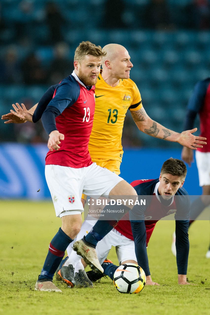 Fredrik Midtsjø of Norway and Aaron Mooy of Australia