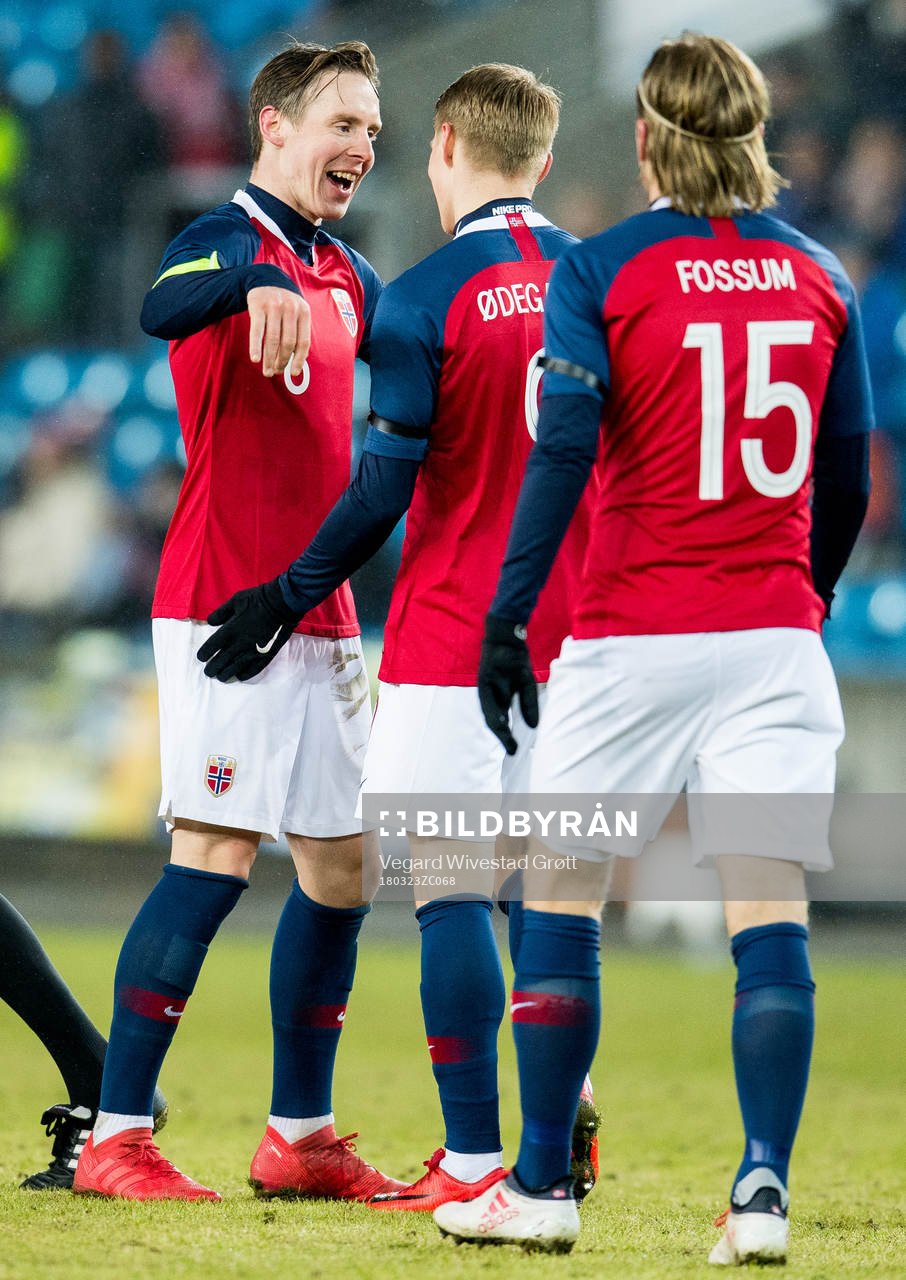 Stefan Johansen, Martin Ødegaard and Iver Fossum celebrate