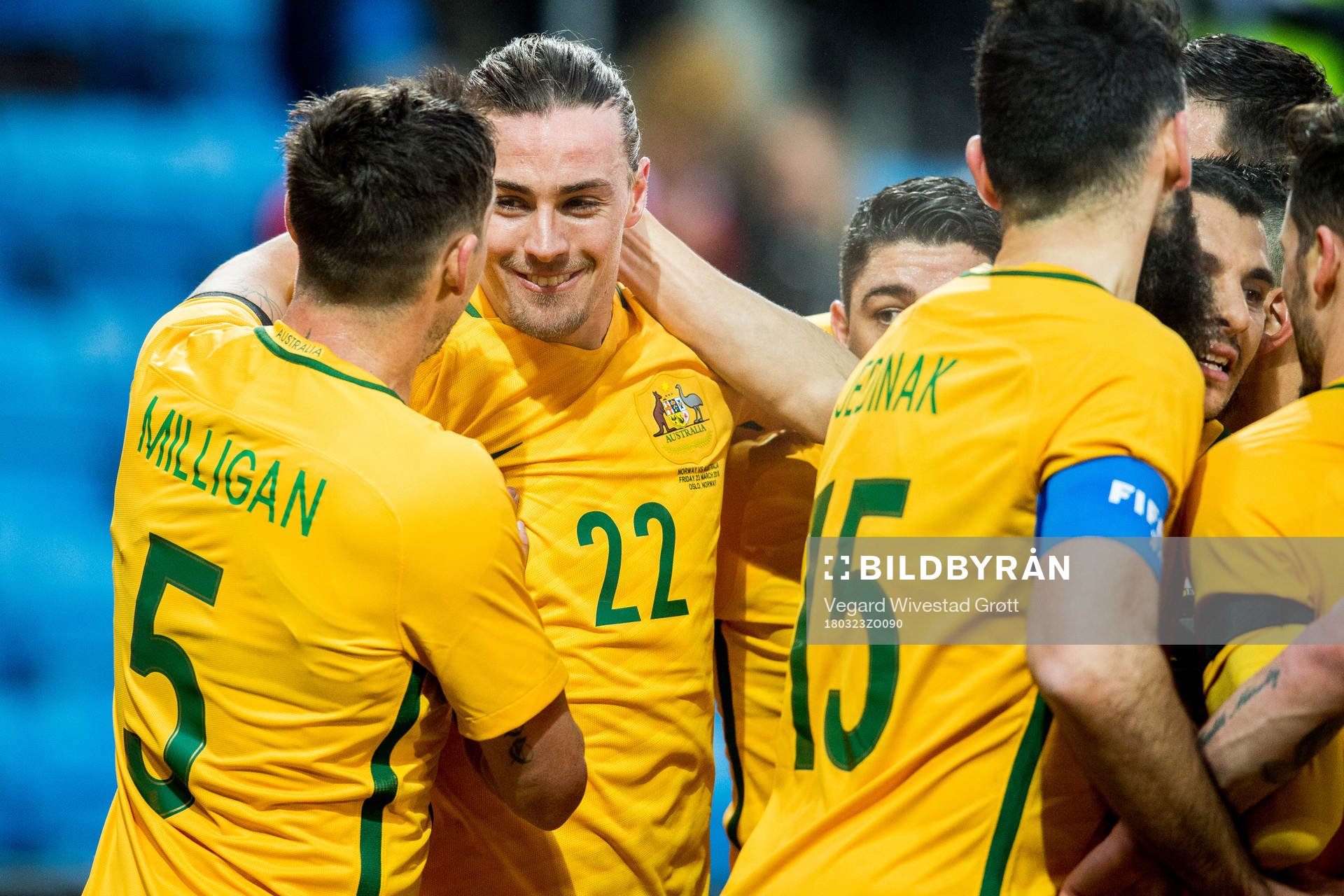Jackson Irvine of Australia celebrates with teammate Mark
