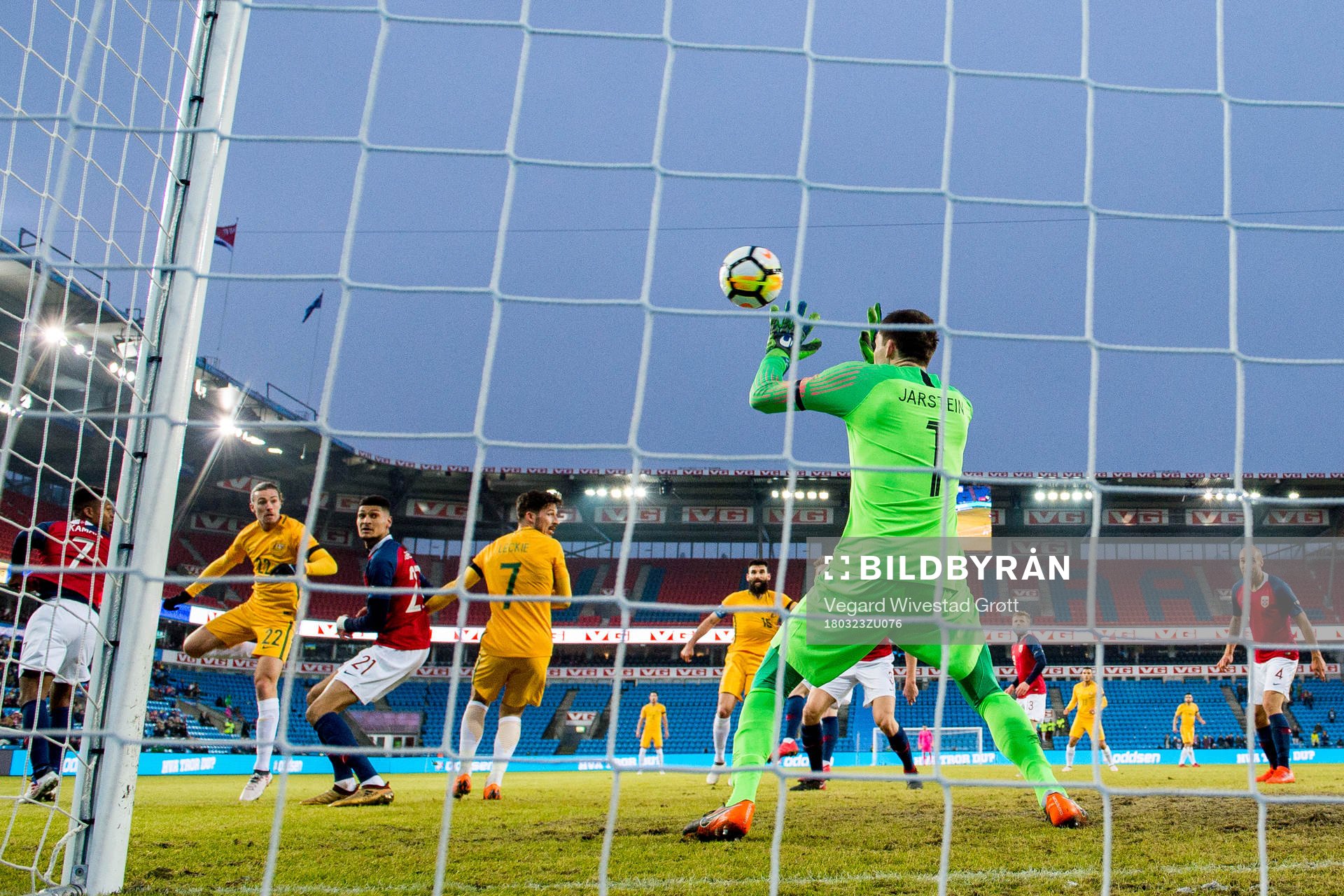 Jackson Irvine of Australia scores 0-1 behind goalkeeper