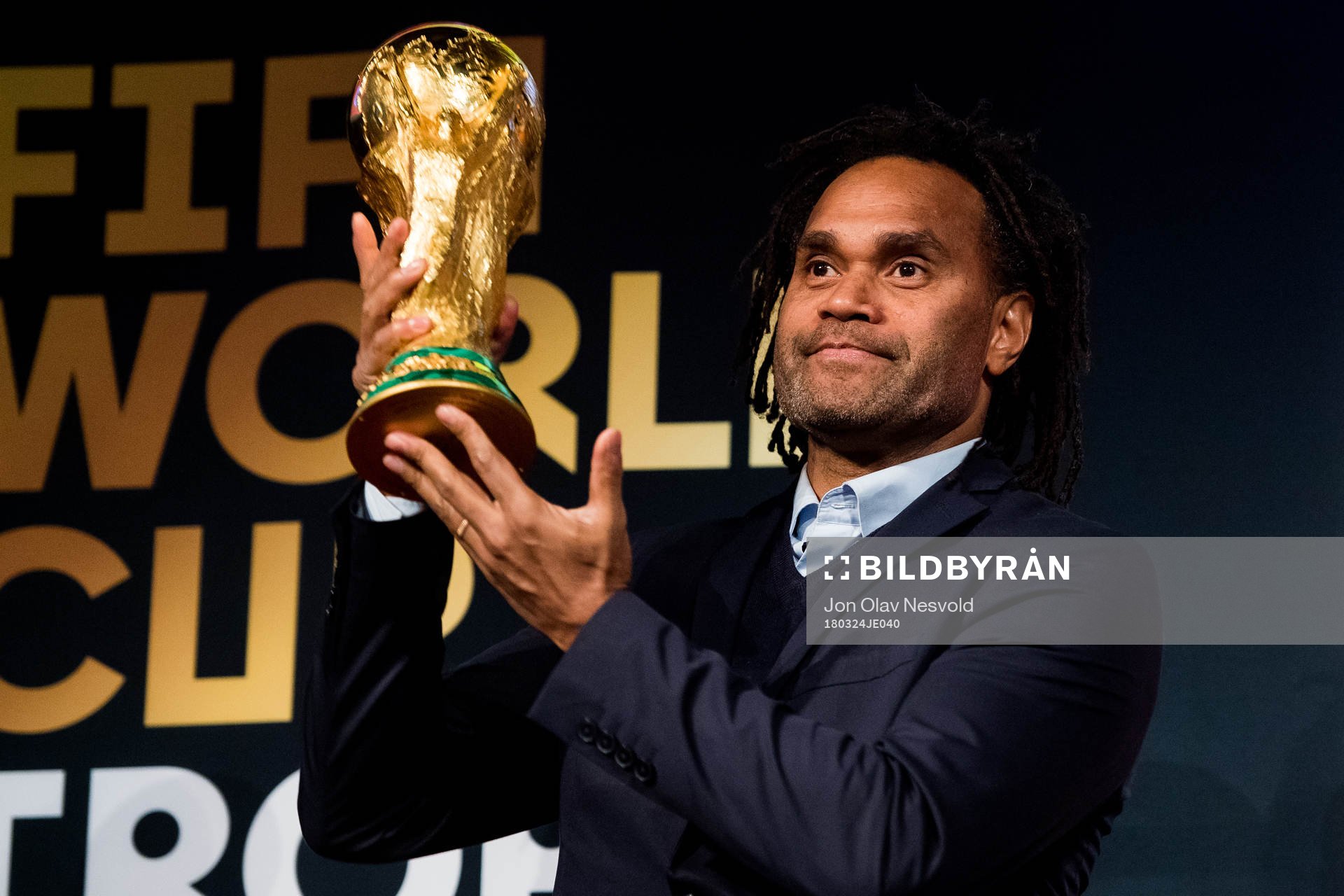 Christian Karembeu, former football player and World Cup winner, presents the World Cup Trophy during the FIFA World Cup Trophy Tour on March 24, 2018 in Oslo.