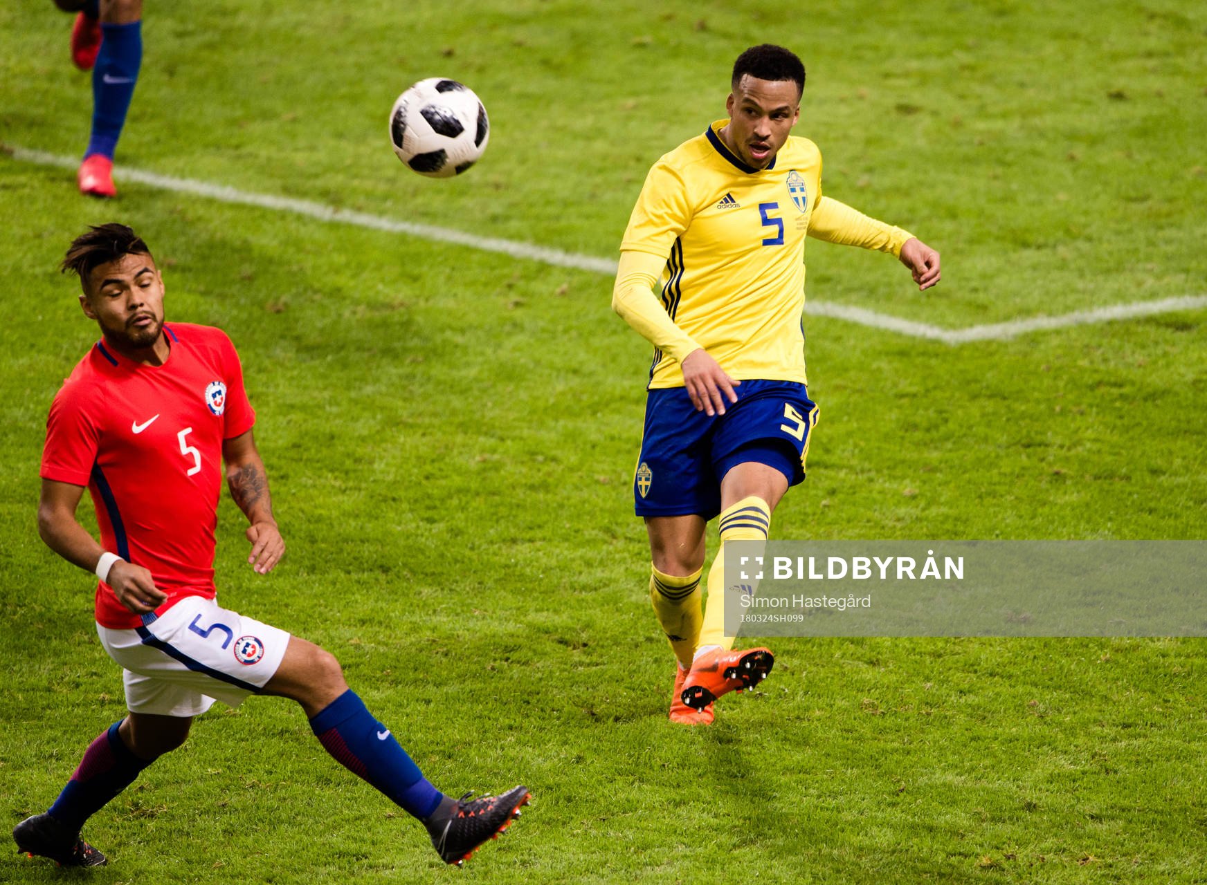 Chiles Paulo Diaz och Sveriges Martin Olsson