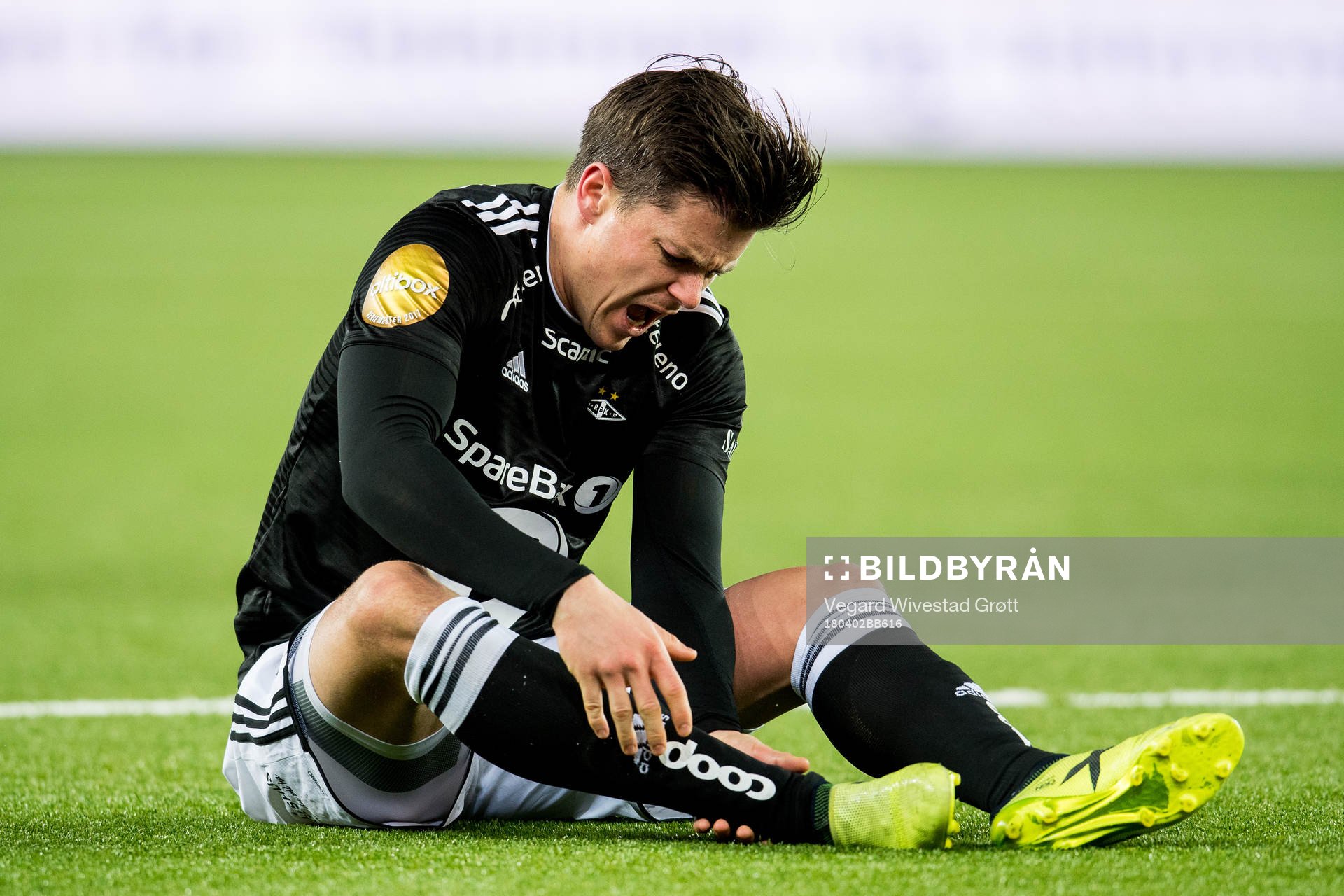 Pål André Helland of Rosenborg with an injury