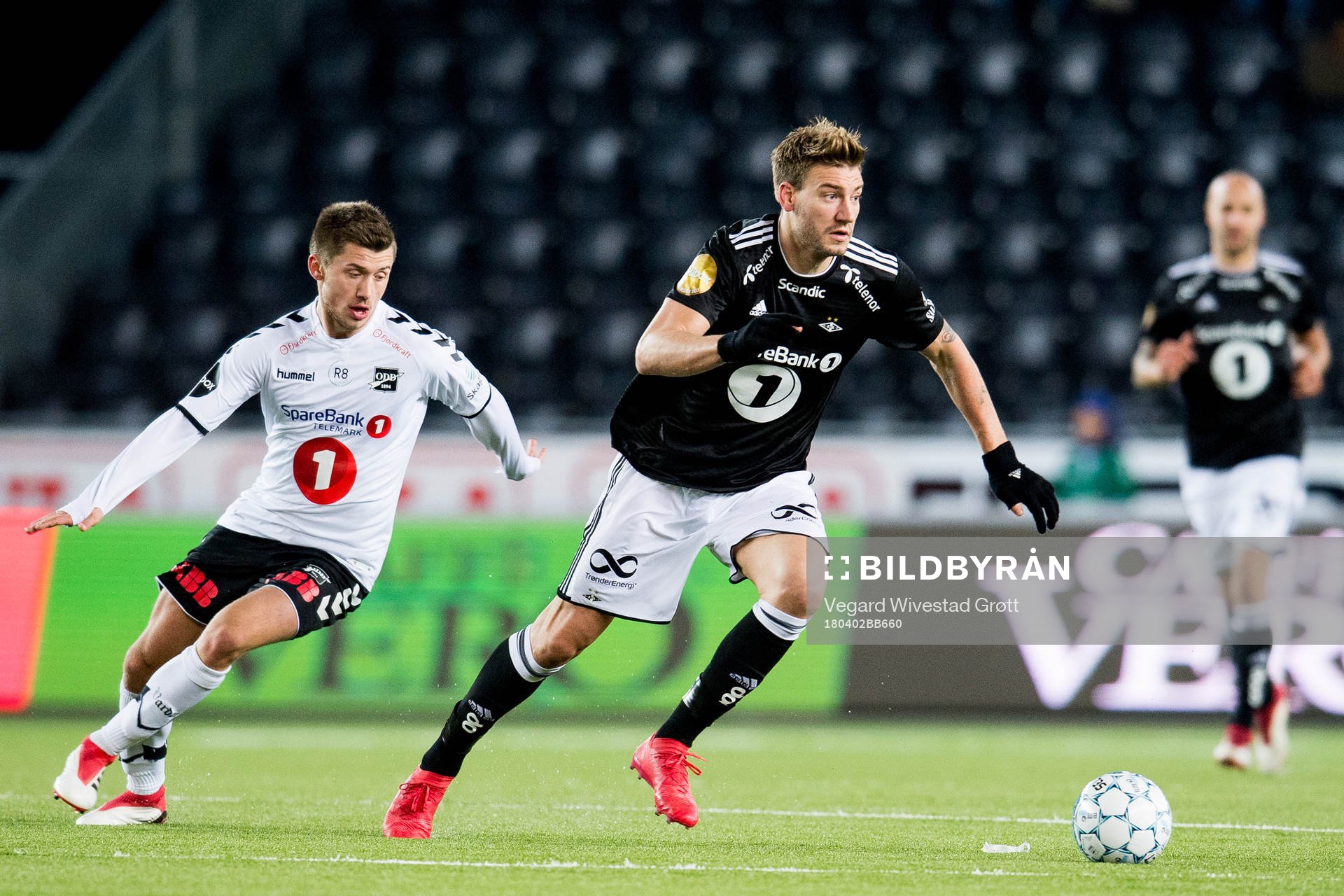 Vebjørn Alvestad Hoff of Odd and Nicklas Bendtner of