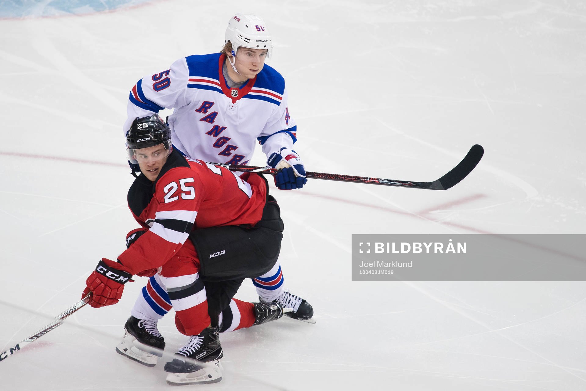 Devils Mirco Mueller och Rangers Lias Andersson