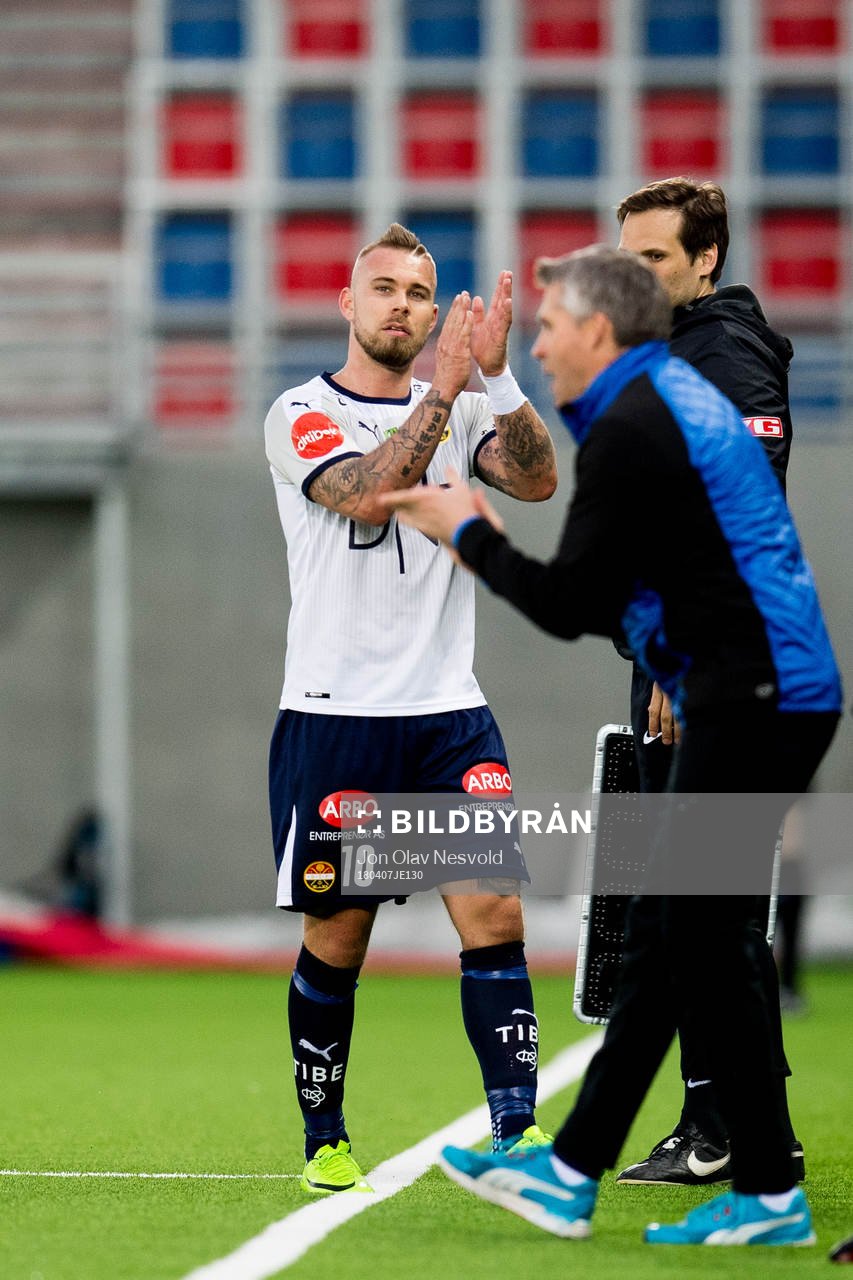Marcus Pedersen of Strømsgodset and Tor Ole Skullerud,