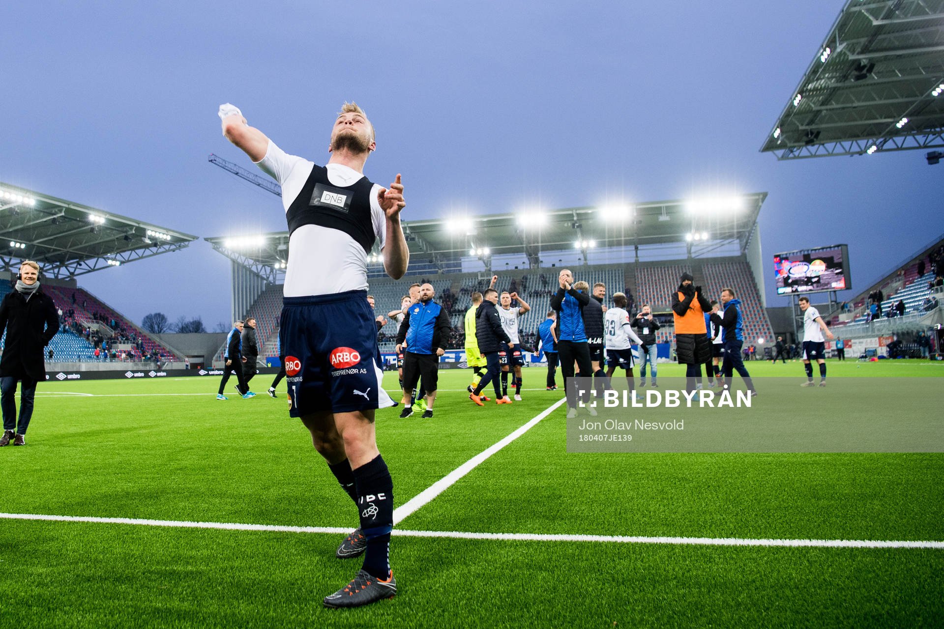 Herman Sørby Stengel of Strømsgodset throws his shirt to