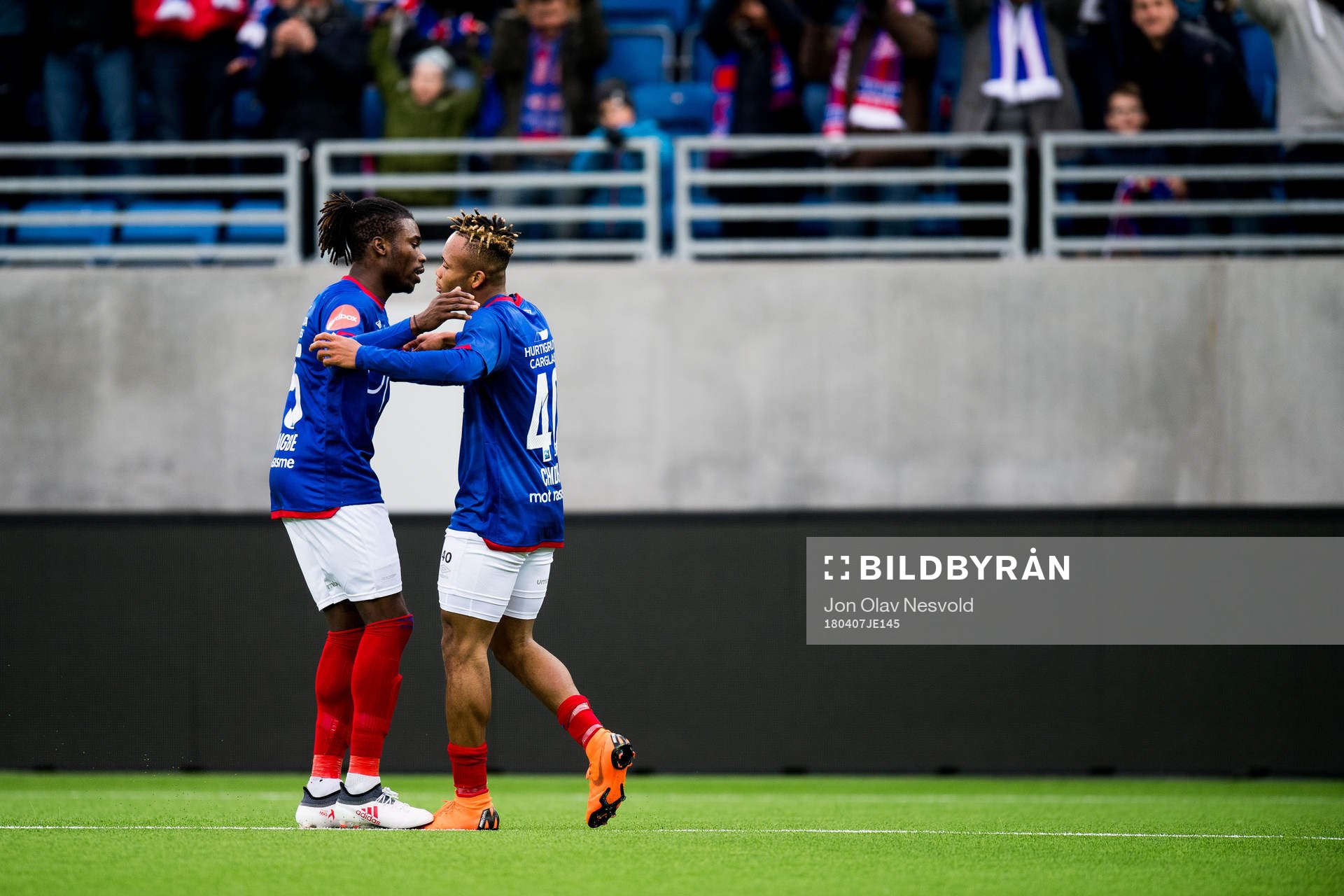 Samuel Adekugbe and Chidera Ejuke of Vålerenga celebrate