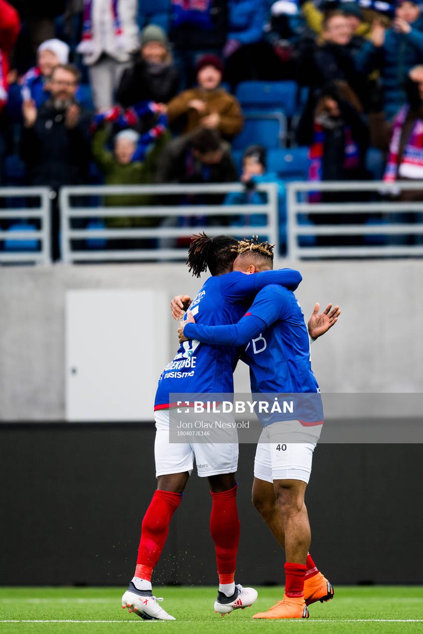 Samuel Adekugbe and Chidera Ejuke of Vålerenga celebrate