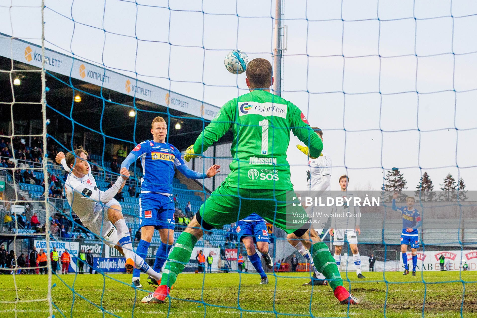 Andreas Helmersen of Ranheim scores 1-2 behind goalkeeper Ingvar Jonsson of Sandefjord during the Eliteserien match between Sandefjord and Ranheim on April 11, 2018 in Sandefjord.