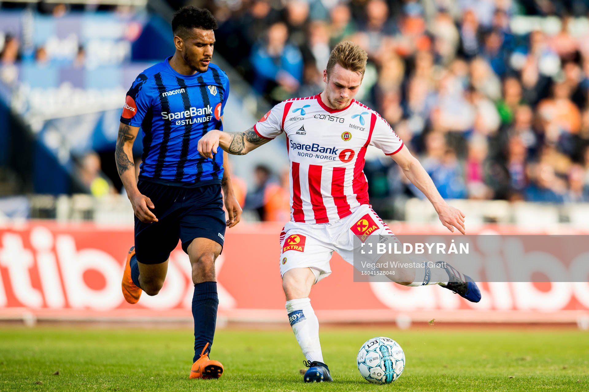 Ohi Omoijuanfo of Stabæk and Kent-Are Antonsen of Tromsø