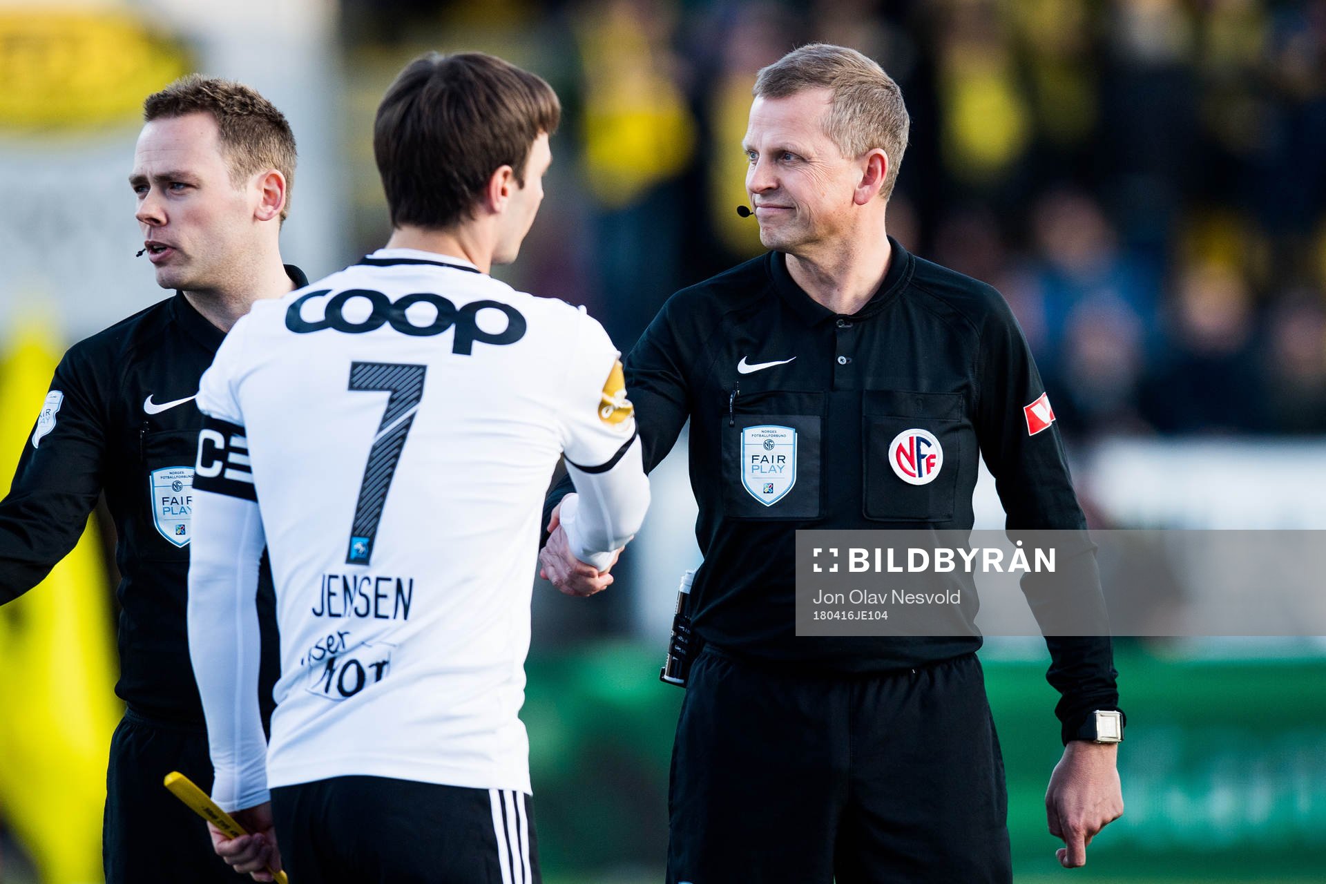 Mike Jensen of Rosenborg and Trygve Kjensli, referee