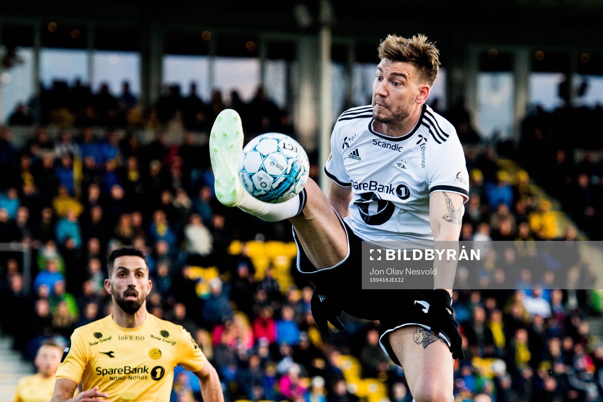 Isidoro of Bodø/Glimt and Nicklas Bendtner of Rosenborg during the Eliteserien match between Bodø/Glimt and Rosenborg on April 16, 2018 in Bodø.