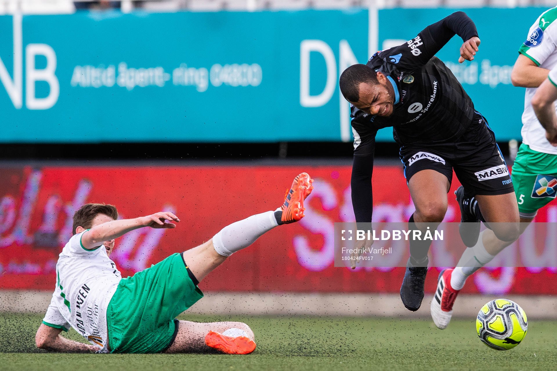 Petter Vaagan Moen of HamKam tackles Erixon Danso of