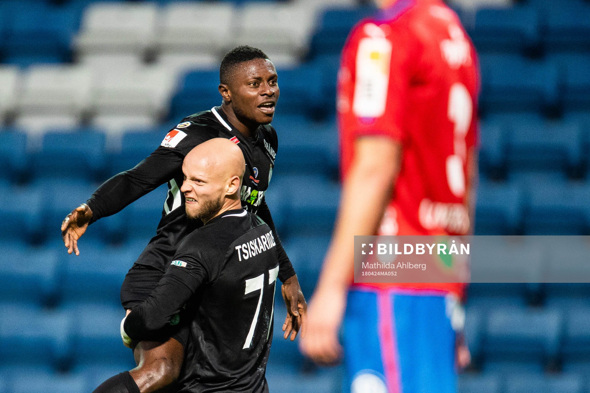 AFC Eskilstunas Zourab Tsiskaridze och Oke Akpoveta jublar efter segern i fotbollsmatchen i Superettan mellan Helsingborg och AFC Eskilstuna den 24 april 2018 i Helsingborg.