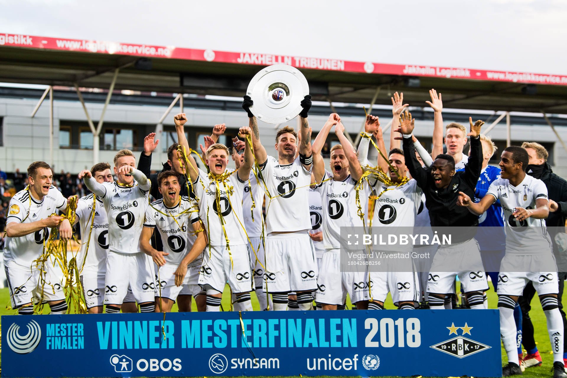 Nicklas Bendtner of Rosenborg and his teammates celebrate with the trophy after winning the UNICEF Mesterfinale match between Lillestrøm and Rosenborg on April 26, 2018 in Lillestrøm.