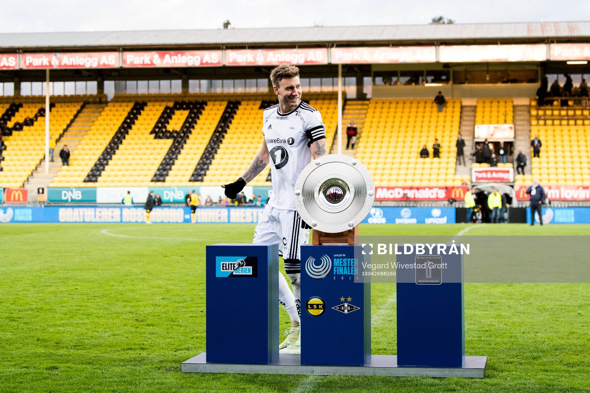 Nicklas Bendtner of Rosenborg walks past the trophy after winning the UNICEF Mesterfinale match between Lillestrøm and Rosenborg on April 26, 2018 in Lillestrøm.