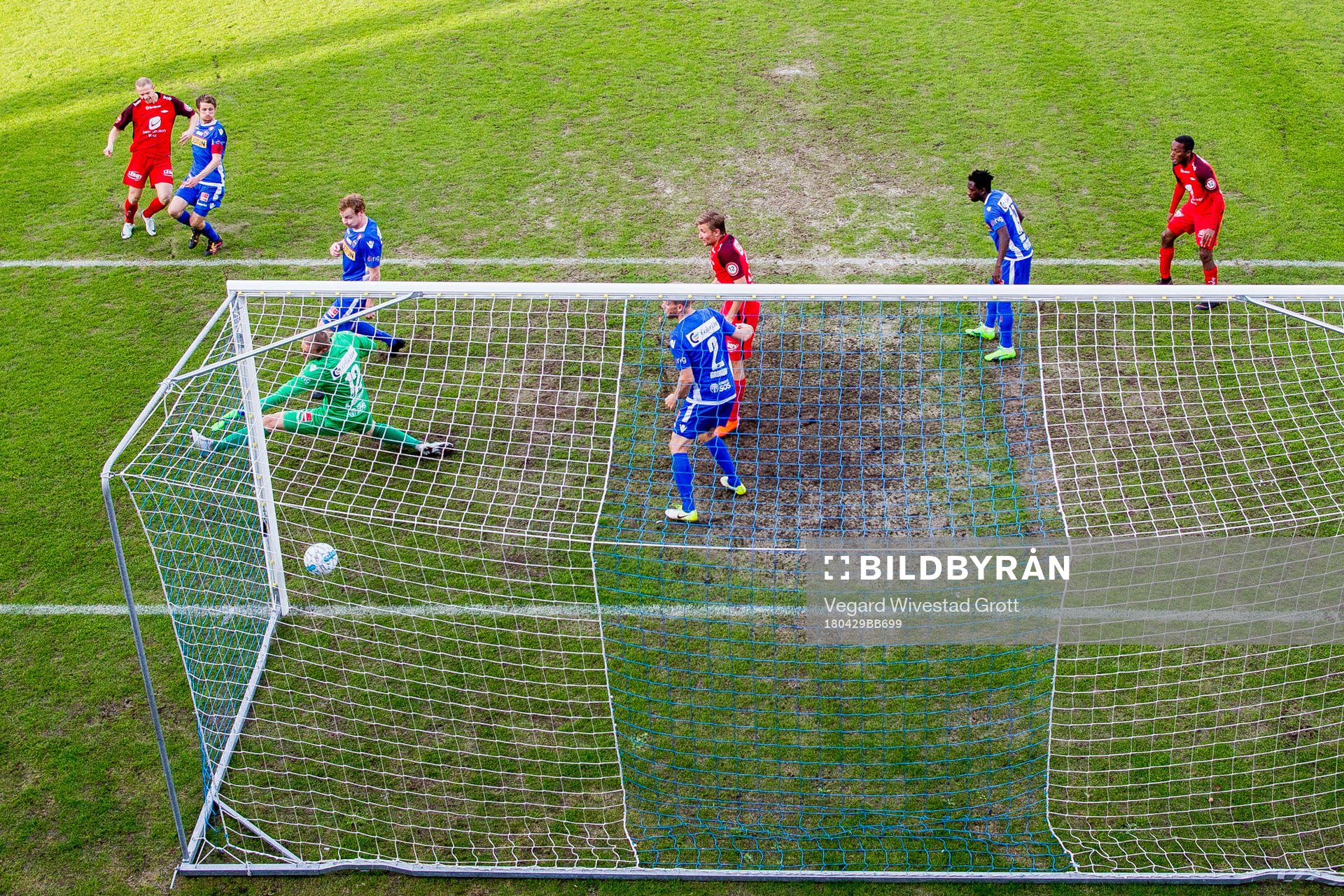 Peter Orry Larsen of Brann scores 0-1 behind goalkeeper