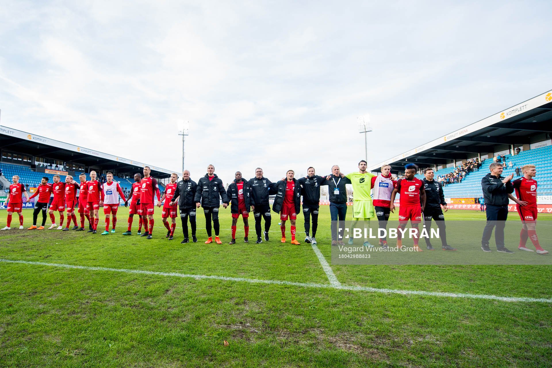 Players and staff of Brann celebrate
